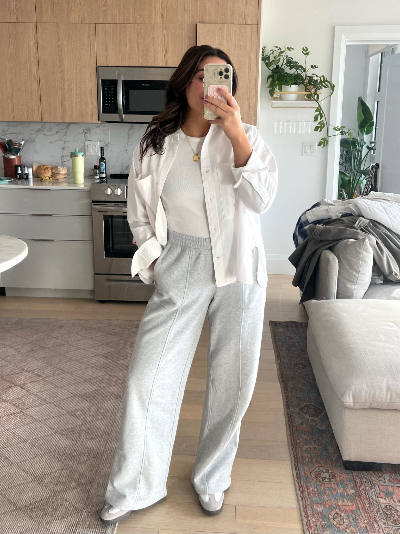 Love this comfy outfit! These sweats from Aerie are great if you want a sweatpant that isn’t the jogger style. Super comfy! Paired them with a high neck tank + a white button down & my adidas sambas.

Sizing: all true to size, M 

#LTKstyletip #LTKfindsunder100 #LTKSeasonal