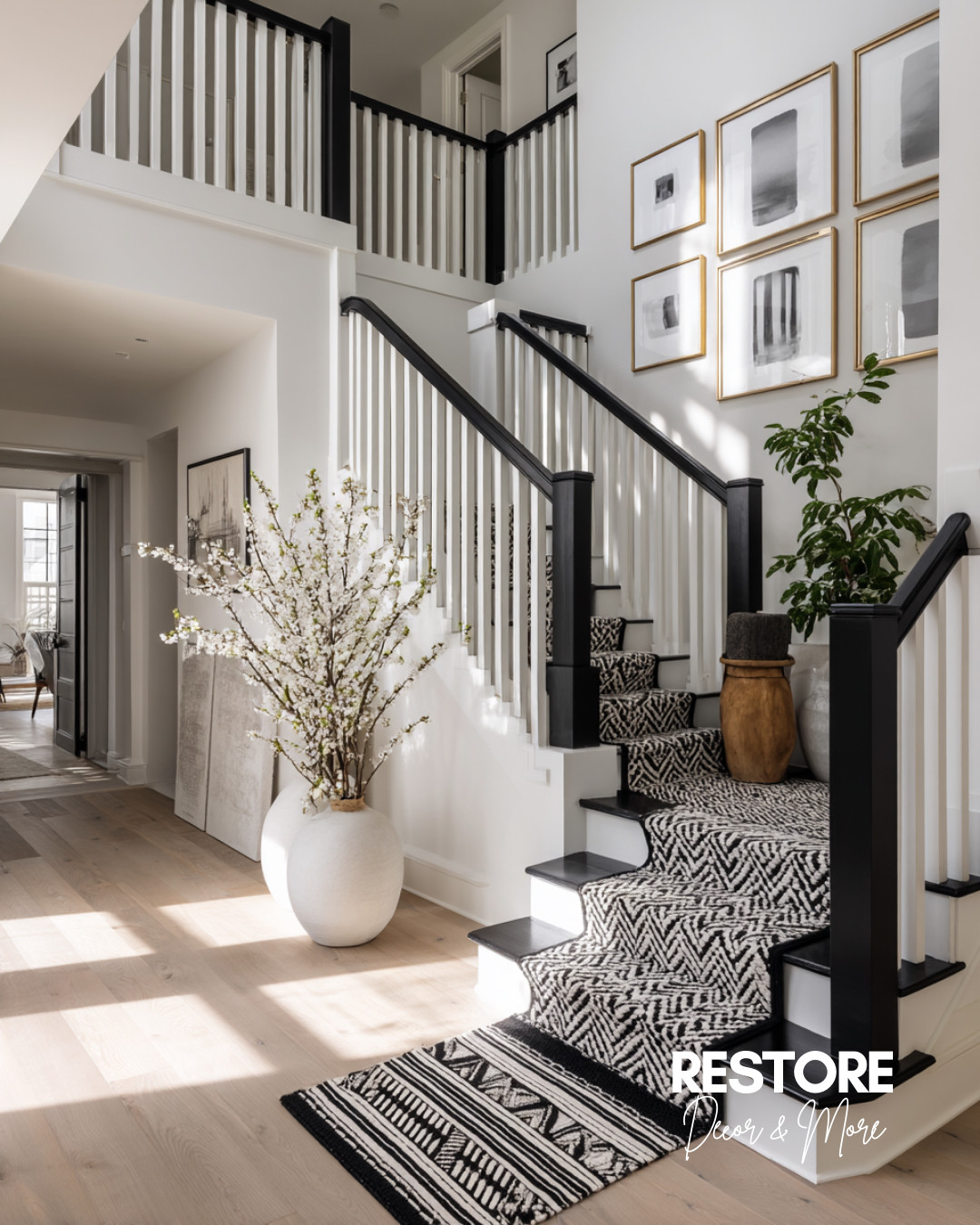 One of my favorite entryway looks right now 🤍 The bold runner adds just the right amount of pattern, and that oversized vase with cherry blossoms brings in such a soft, natural touch. The oak floors and modern gallery frames tie it all together beautifully. Linking similar pieces so you can recreate this look in your own home!
.
.
#entrywaystyle #neutraldecor #modernhomeinspo #stairrunner #homedecorideas #fauxbranches #vaseobsessed #gallerywall #oakfloors #ltkhome #blackandwhiteaesthetic #restyledspaces 

 #LTKHome