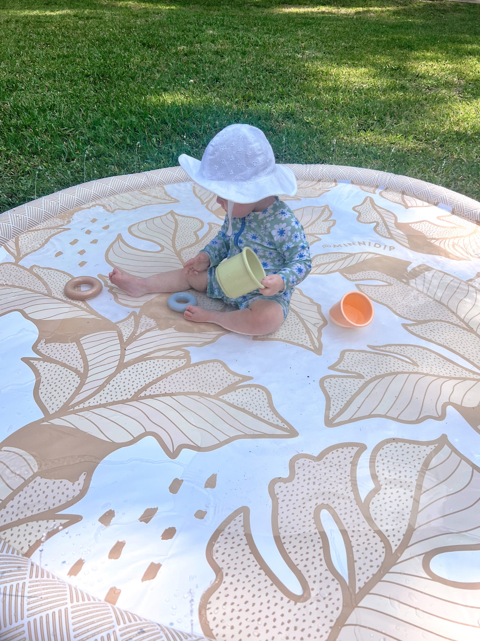 Summer
Minnidip splash pad
Baby splash pad
Baby girl swimsuit 
Baby’s summer hat 
Baby sunscreen 


#LTKfamily #LTKswim #LTKbaby
