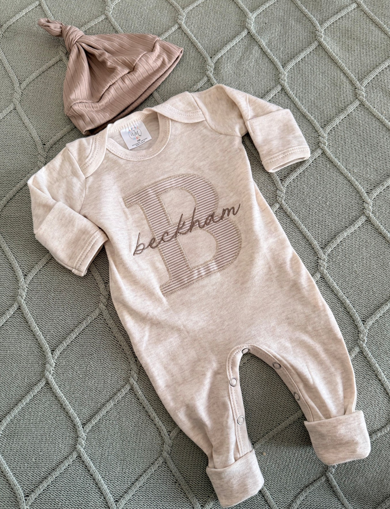 This outfit makes a perfect coming home outfit, newborn pictures, or baby shower gift. This features a soft oatmeal romper, a large initial in beige stripe Personalized coming home outfit 
Embroidered 

Hospital onesie 
Matching hat 


Baby newborn photos 
Name announcement 
personalized gift idea baby shower, gender neutral boy girl
Etsy monogram footie sleeper 


#LTKBump #LTKmomlife #LTKBaby
