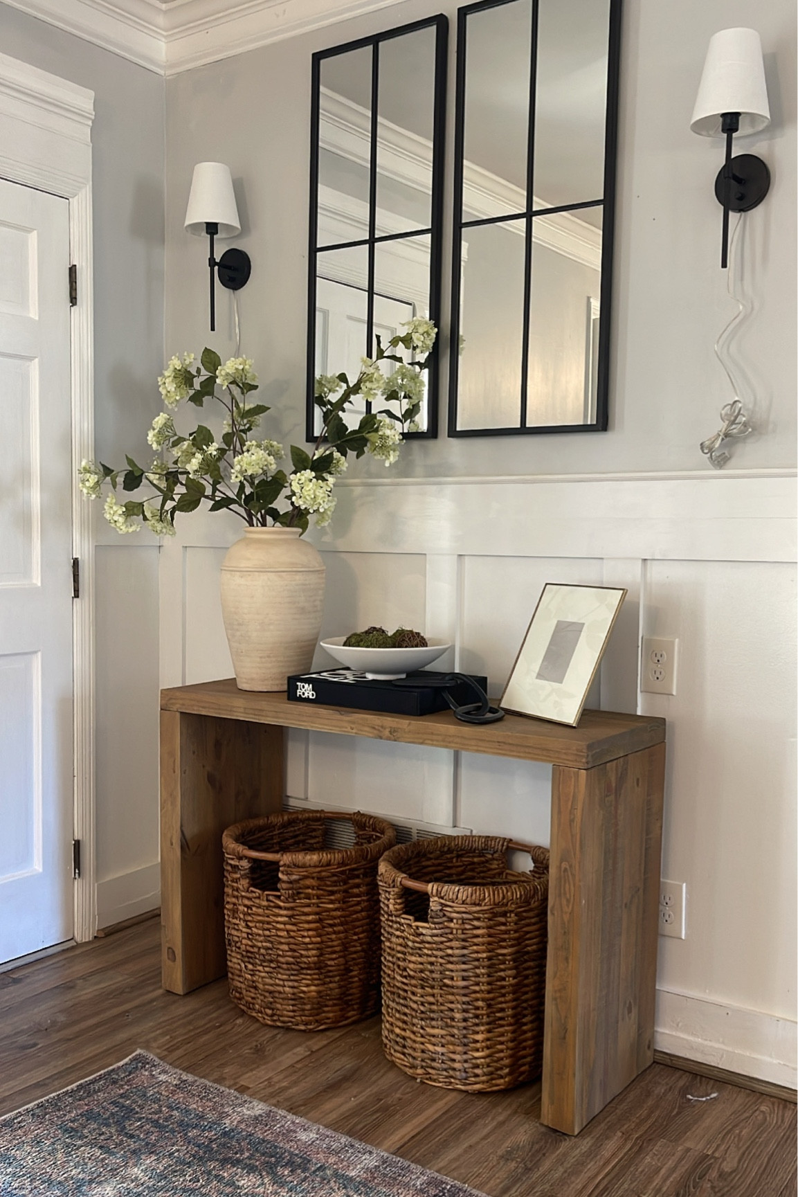 Entryway decor inspo

Antique vase, modern console table, paned mirror, sconces

#LTKFind #LTKstyletip #LTKhome