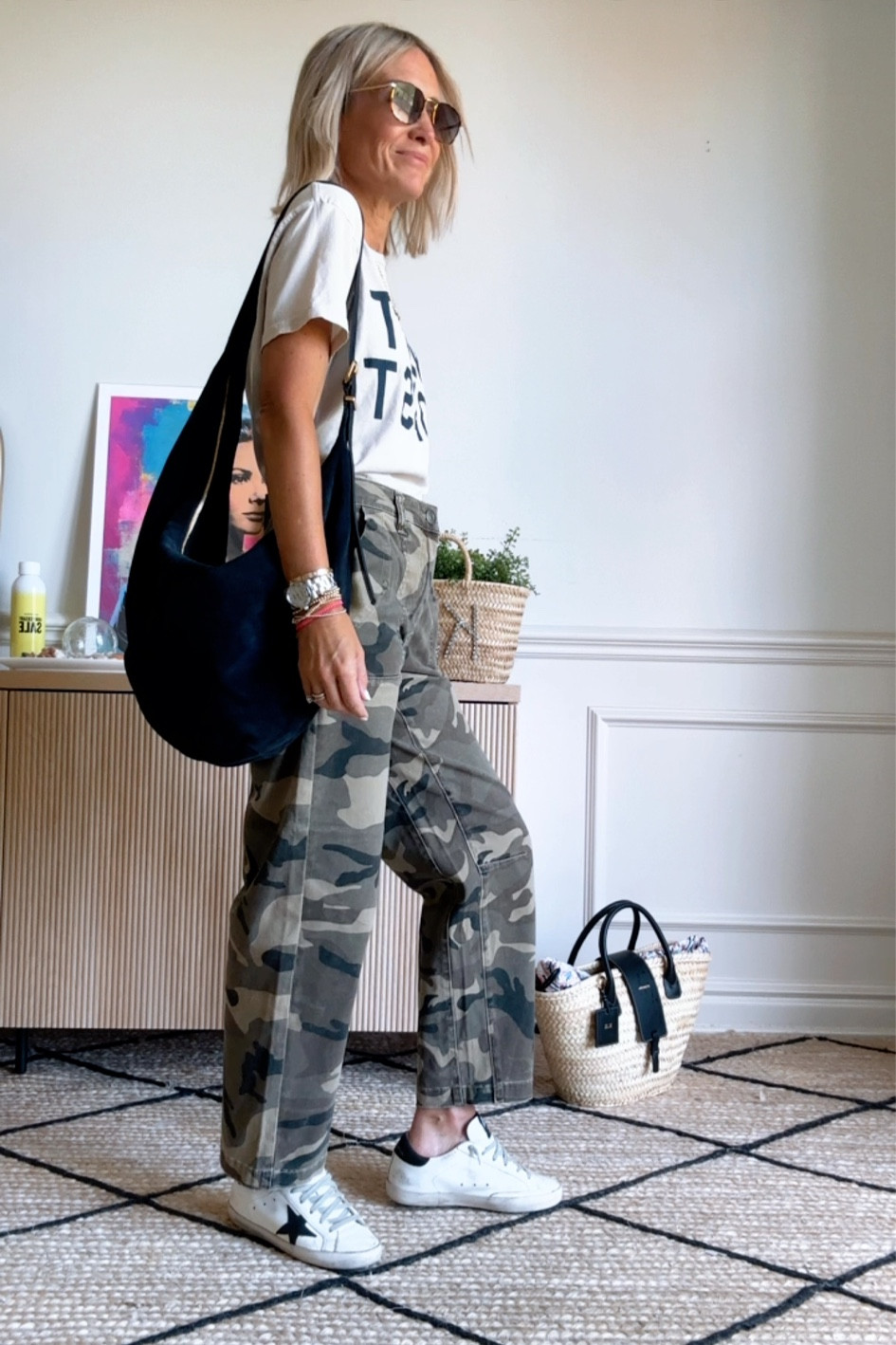 Everyday style
Wear what you love
Sneakers
Camo pants- run big- go with smaller size. I’m in 00 ( I wear a 24 or 25 in jeans)
Graphic tee
Oversized bag
Sneakers

#LTKStyleTip #LTKOver40 #LTKBacktoSchool