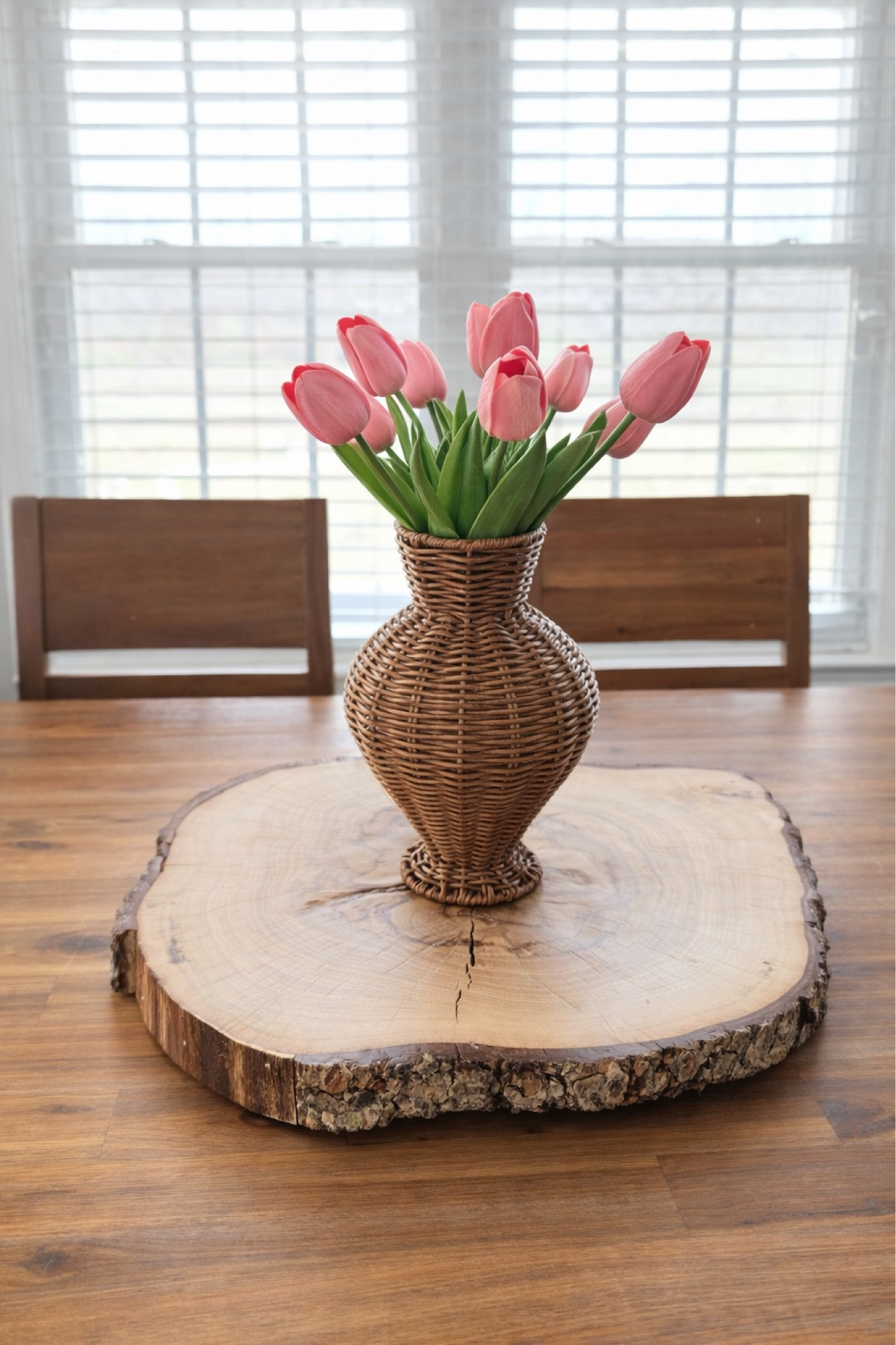 Simple spring centerpiece idea 🌷
These realistic tulips instantly brighten a dining table and I love the natural wicker vase paired with a rustic wood slab. Such an easy way to refresh your home for spring.

#springdecor #amazonhomefinds #springtabledecor #ltkhome #amazonhome #neutralhome #homedecorideas

#LTKSpringSale #LTKHome