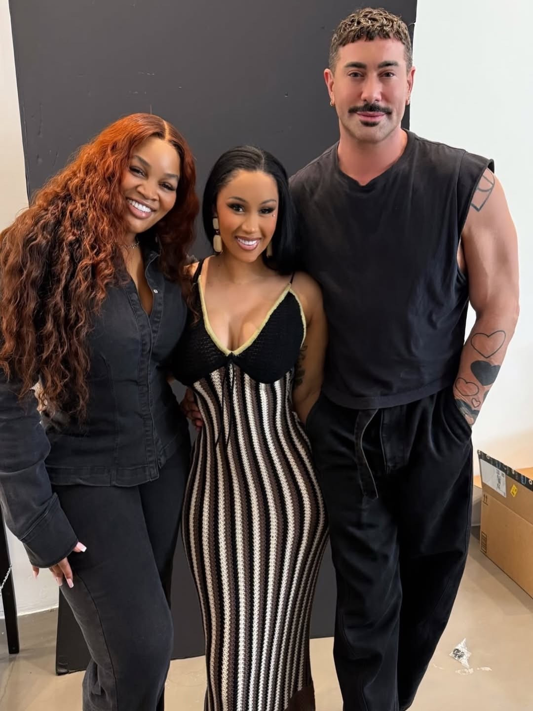 @iamcardib posed on set with her manager @iam_kingpee and @mrdrawas while working with @revolve on her upcoming clothing and hair lines, wearing a $385 @osis.studio Victoria Maxi dress . Find a link to purchase in our bio. Hot! Or Hmm..?

📸: Photo via @mrdrawas

#CardiBFBD #cardib #cardibstyle #fashionbombdaily #fbdaily #BombStyle
