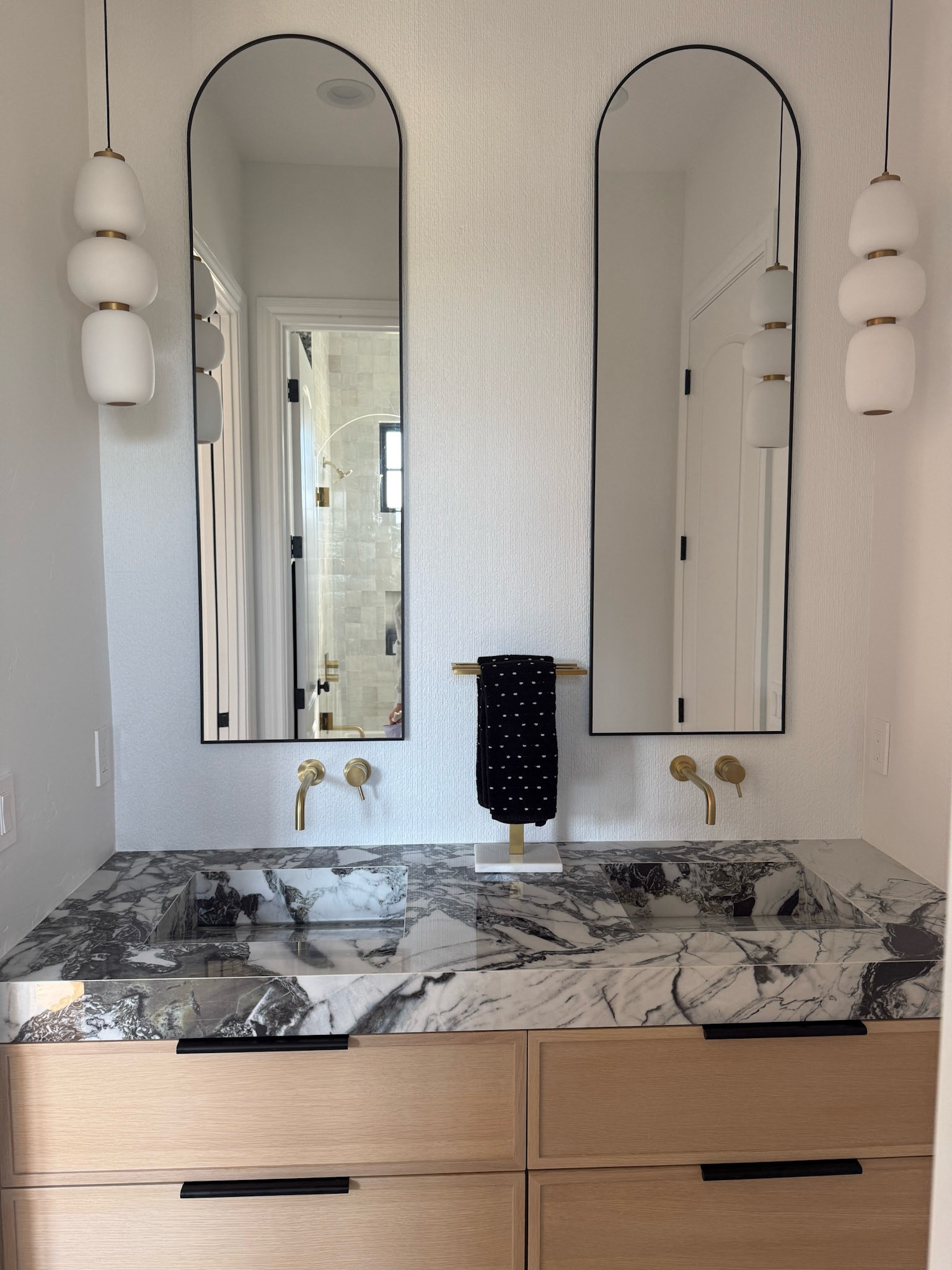 I love this gold bathroom hand  towel holder with the marble base and black and white polka dot hand towels!

#LTKHome