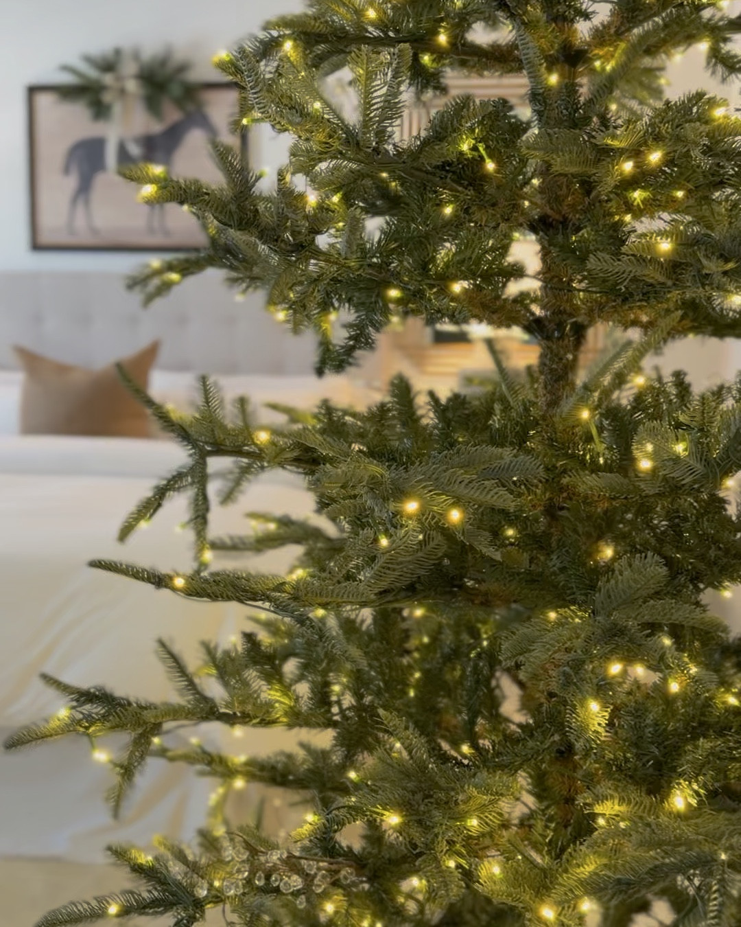 Christmas bedroom 2025, kept it simple! Added a swag above my new horse art and a full size Christmas tree to keep things merry n bright! 

#LTKSaleAlert #LTKHome #LTKHoliday