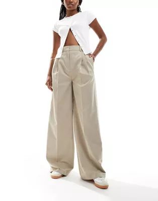 ASOS DESIGN buckle waist detail trousers in beige | ASOS | ASOS (Global)