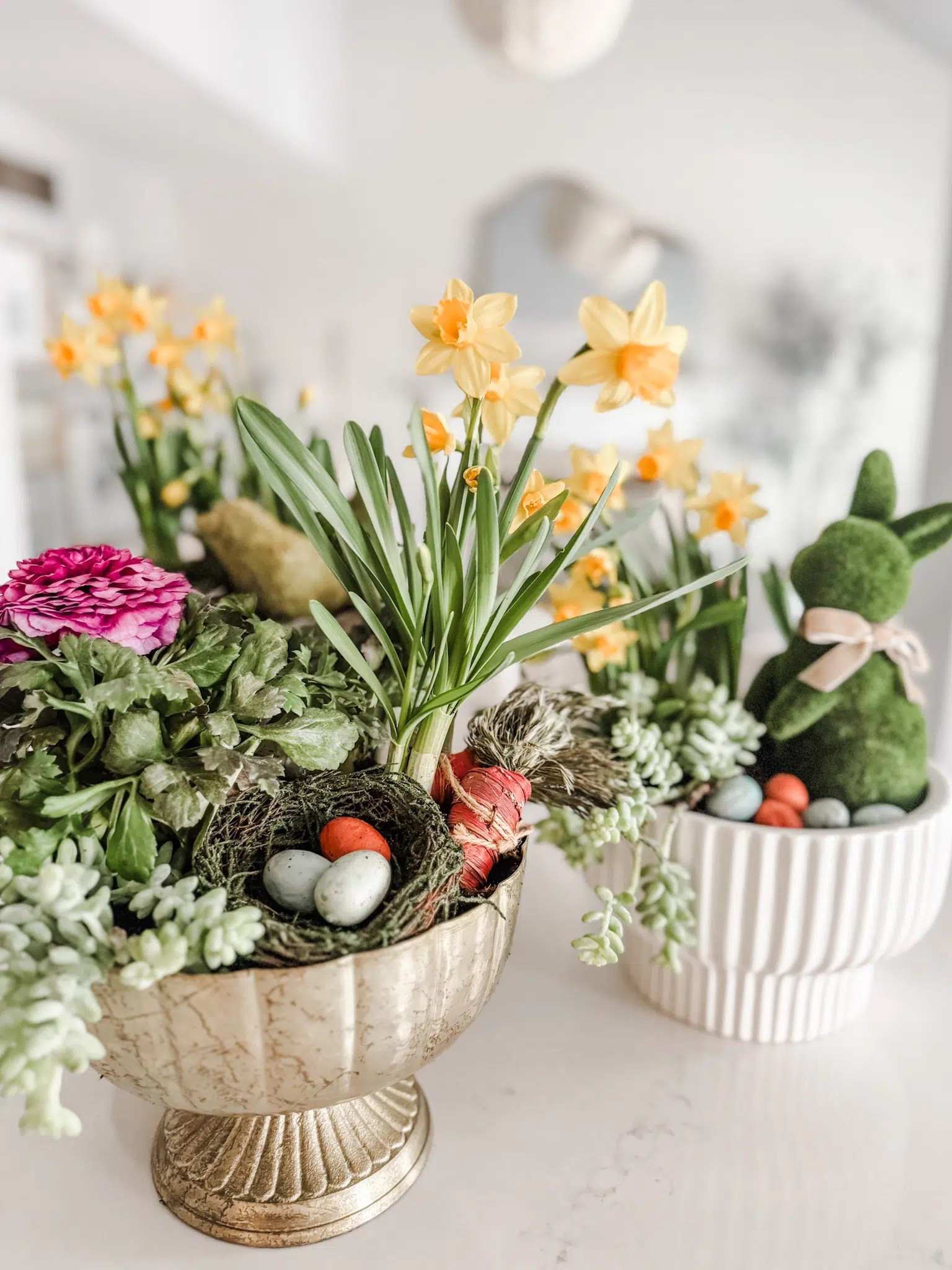 Gold pedestal compote
White ceramic fluted planter 
Mossy bunny
Green flicked bunny
Easter decor
Spring planter idea
Gold planter


#LTKSeasonal #LTKStyleTip #LTKHome