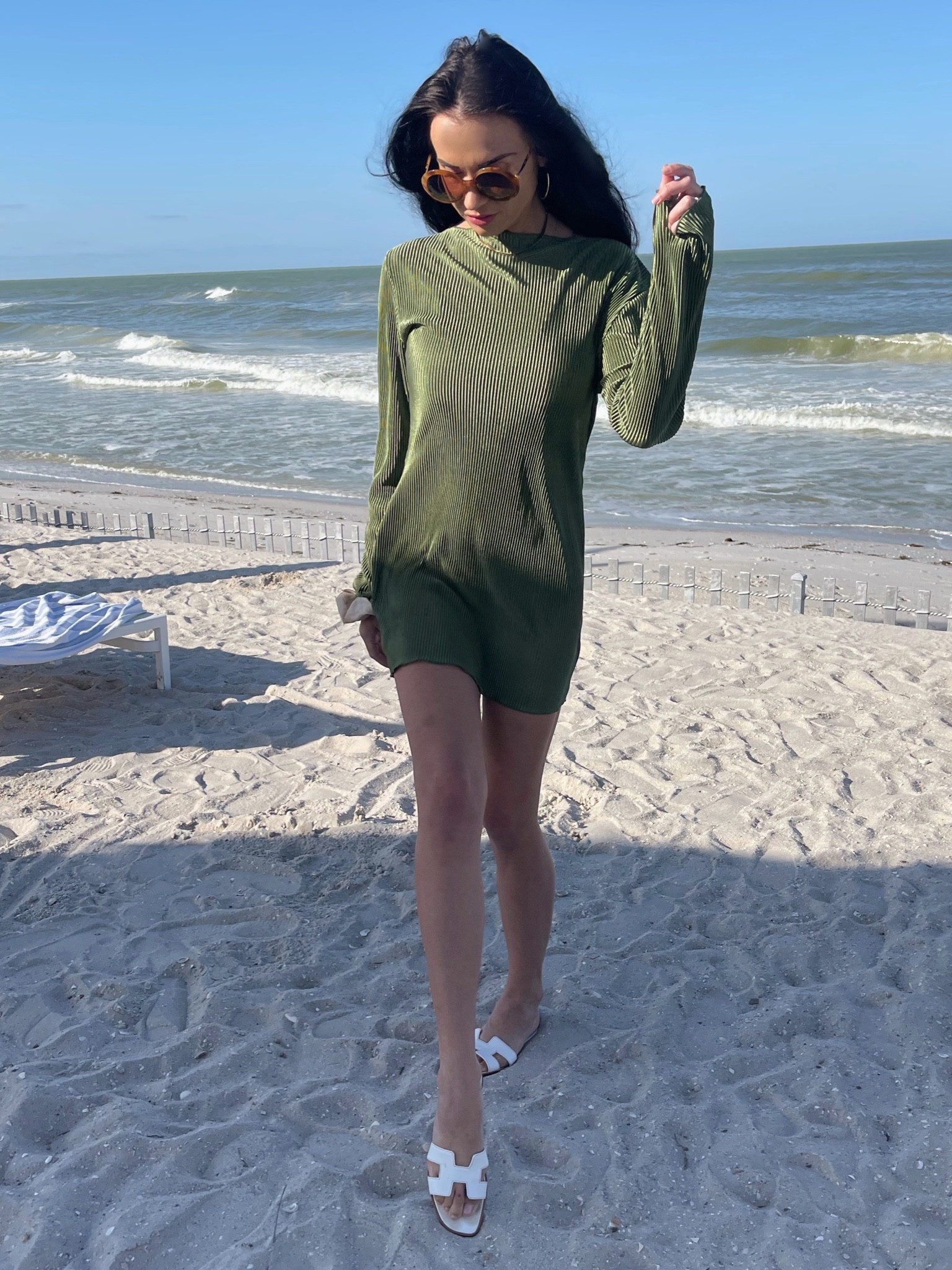 Mix of high and low end beach chic look. Olive long sleeve mini dress for $11 🤯 look expensive for less! Chic affordable vacation outfit. 

#LTKswim #LTKtravel #LTKunder50