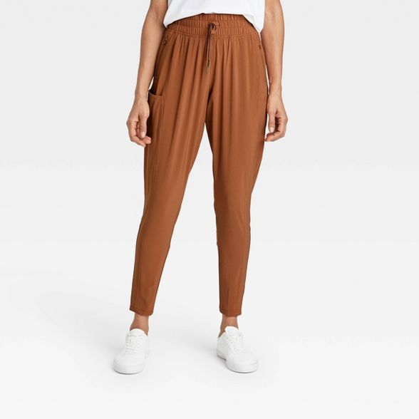 Women&#39;s Tapered Stretch Woven Mid-Rise Pants - All in Motion&#8482; Chestnut S | Target