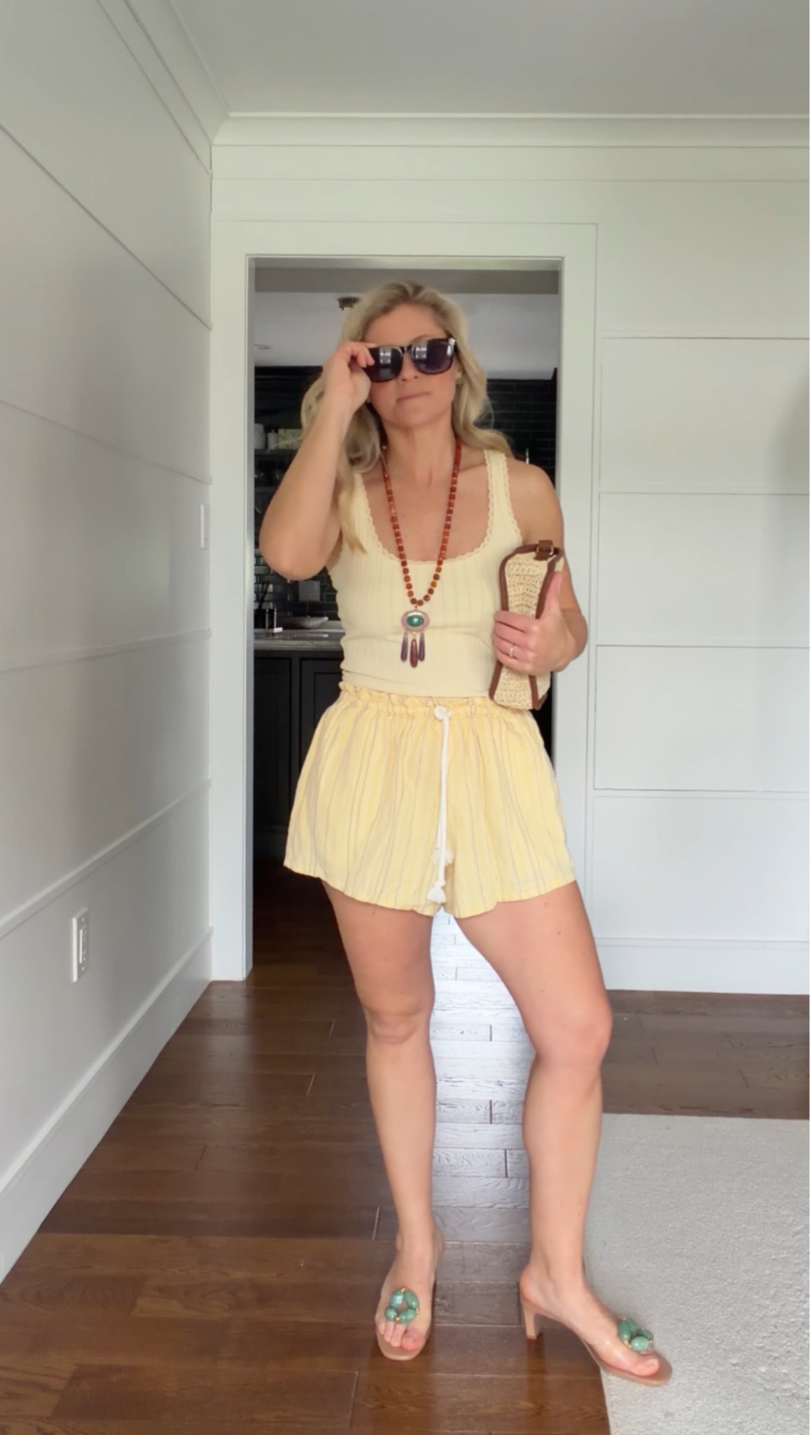 Simple, styled, and vacation ready ☀️

A fitted tank paired with these easy pull on shorts is one of my favorite warm weather combos. It feels effortless but still looks put together.

I kept my signature accessories the same, statement necklace, raffia clutch, and these heels, so everything mixes seamlessly with the rest of my suitcase.

This is how I pack. Pieces that work together, repeat easily, and give you multiple outfits without overthinking it.

Easy formula: fitted top + relaxed short + statement accessories = go to summer outfit.

#LTKootd #LTKSeasonal #LTKTravel