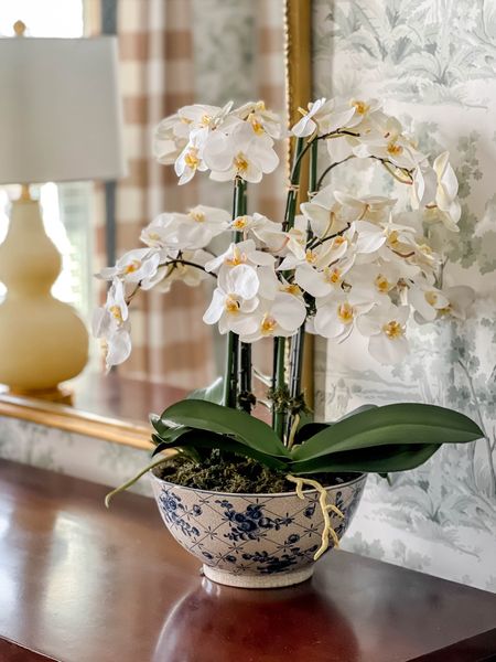 This lovely faux orchid is a beautiful focal point in my dining room.

#LTKHome