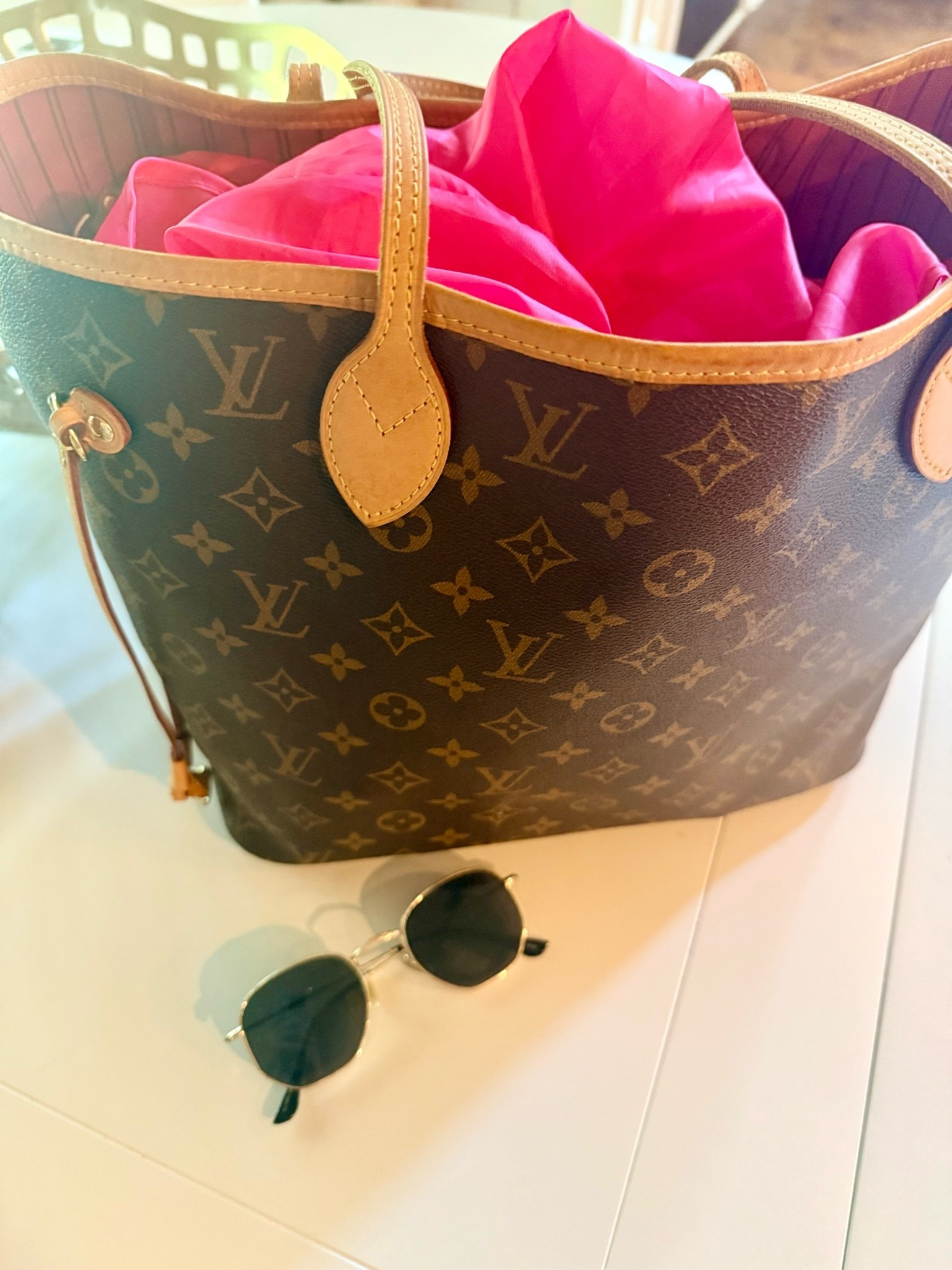 Louis Vuitton tote

#LTKOver40 #LTKTravel #LTKmomlife