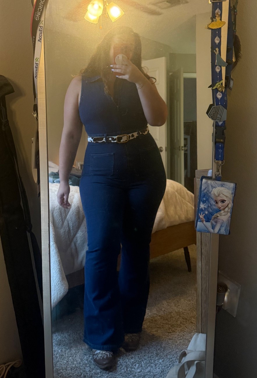 Serving effortless western chic 🤎✨ This dark denim jumpsuit is so flattering and easy to dress up or down! I paired it with my cow print belt for a fun statement moment and these comfy brown boots to pull it all together. The perfect look for dinner, country concerts, or a little line dancing 💃 

Wearing a size XL in the jumpsuit. A size 8 in the boots. 

#LTKgrwm #LTKootd #LTKMidsize