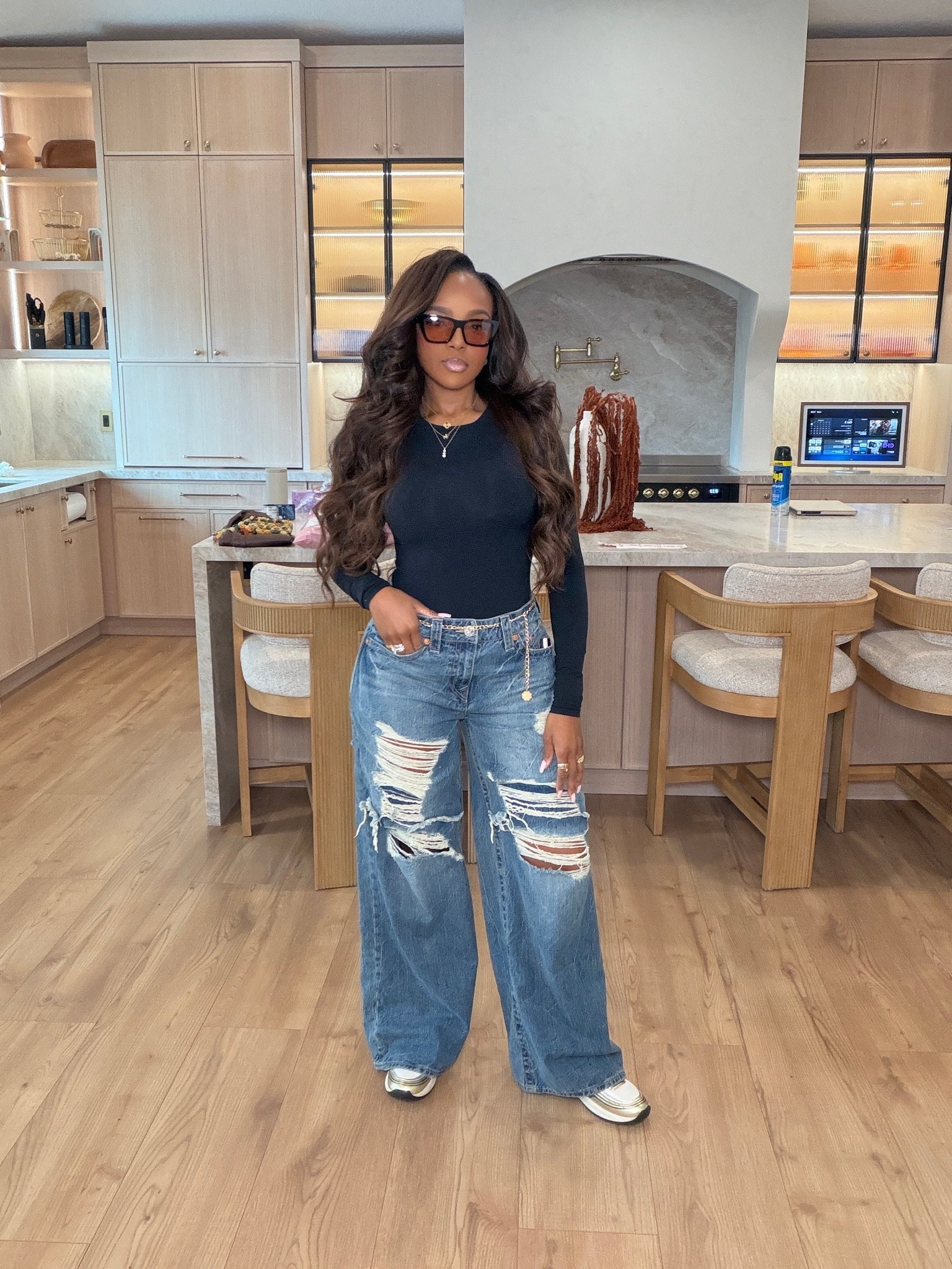 THE COOL-GIRL DENIM COMBO 🖤

A fitted black top + perfectly distressed baggy jeans = the easiest off-duty look. Add statement sunnies and gold accessories and the whole outfit instantly feels elevated.

Wearing: Size Small/4 | 5’4” | 140 lbs | 34D-27-40

distressed baggy jeans, ripped jeans outfit, black top and jeans, casual fall outfit, cool girl outfit, street style women, relaxed denim outfit, elevated casual style, wide leg jeans, everyday outfit ideas, petite denim outfit, fall fashion 2026

📲 Download the FREE LTK app & follow me (@kirasfashionfinds).

#LTKPetite #LTKStyle