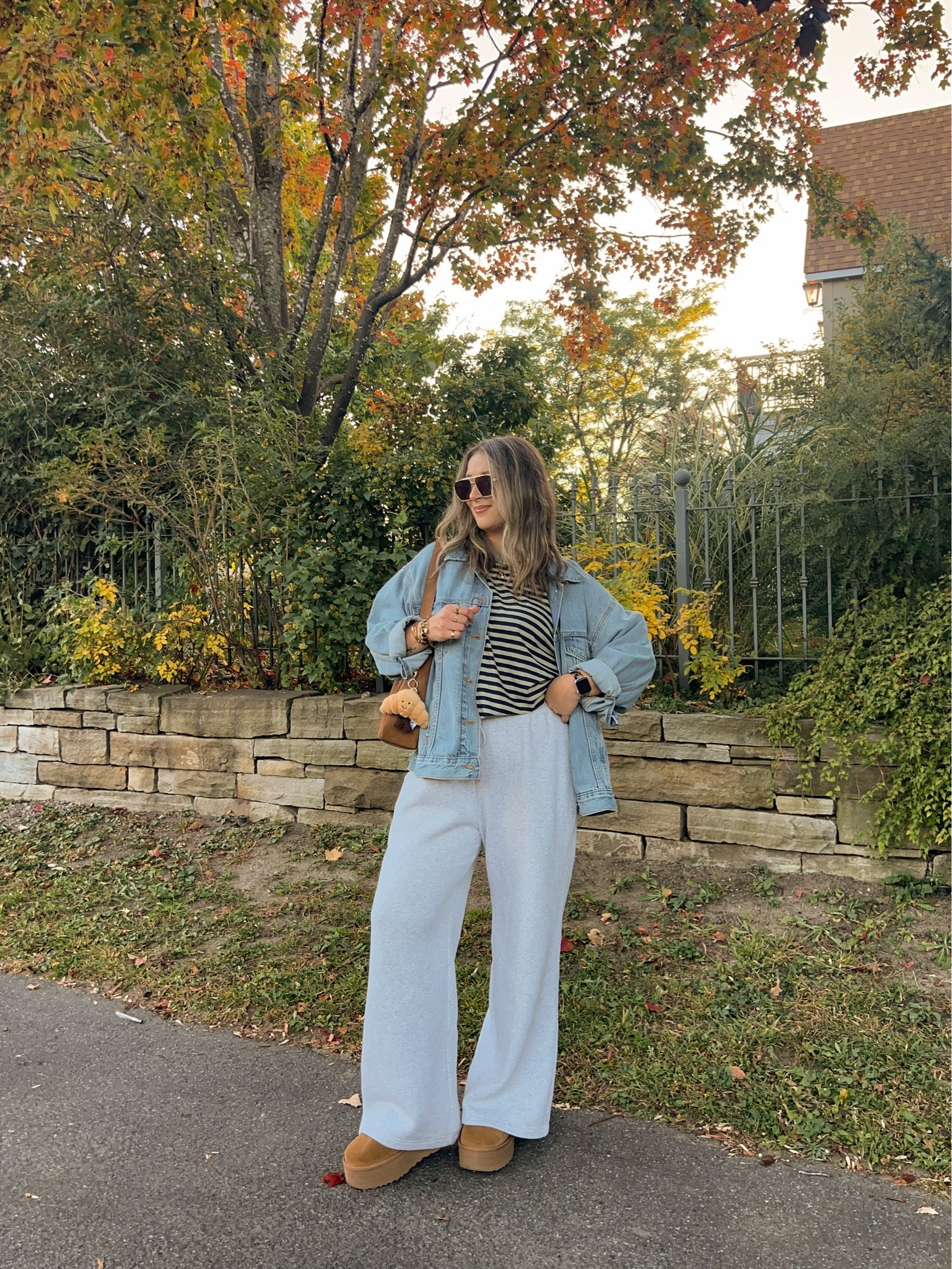 Comfy fall outfit! Wearing size L in the sweatpants and striped tee. Sized up to XL in the denim jacket for an oversized fit. I’m a 9.5-10 shoe and wear a 10 in the Uggs

#LTKfall #LTKsale #LTKstyletip