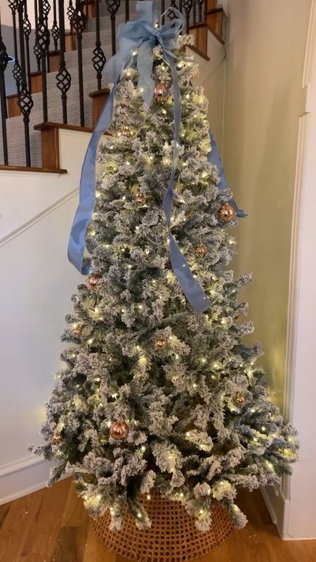 Magical! This Prince flocked Christmas tree from @kingofchristmas is simply stunning! I love all the lights settings, but my favorite is when they just twinkle! Added a wired ribbon and a few ornaments…done! This exact tree is $200 off right now! Comment 🎄tree🎄for details! #kingofchristmas 

#LTKSeasonal #LTKVideo #LTKHoliday