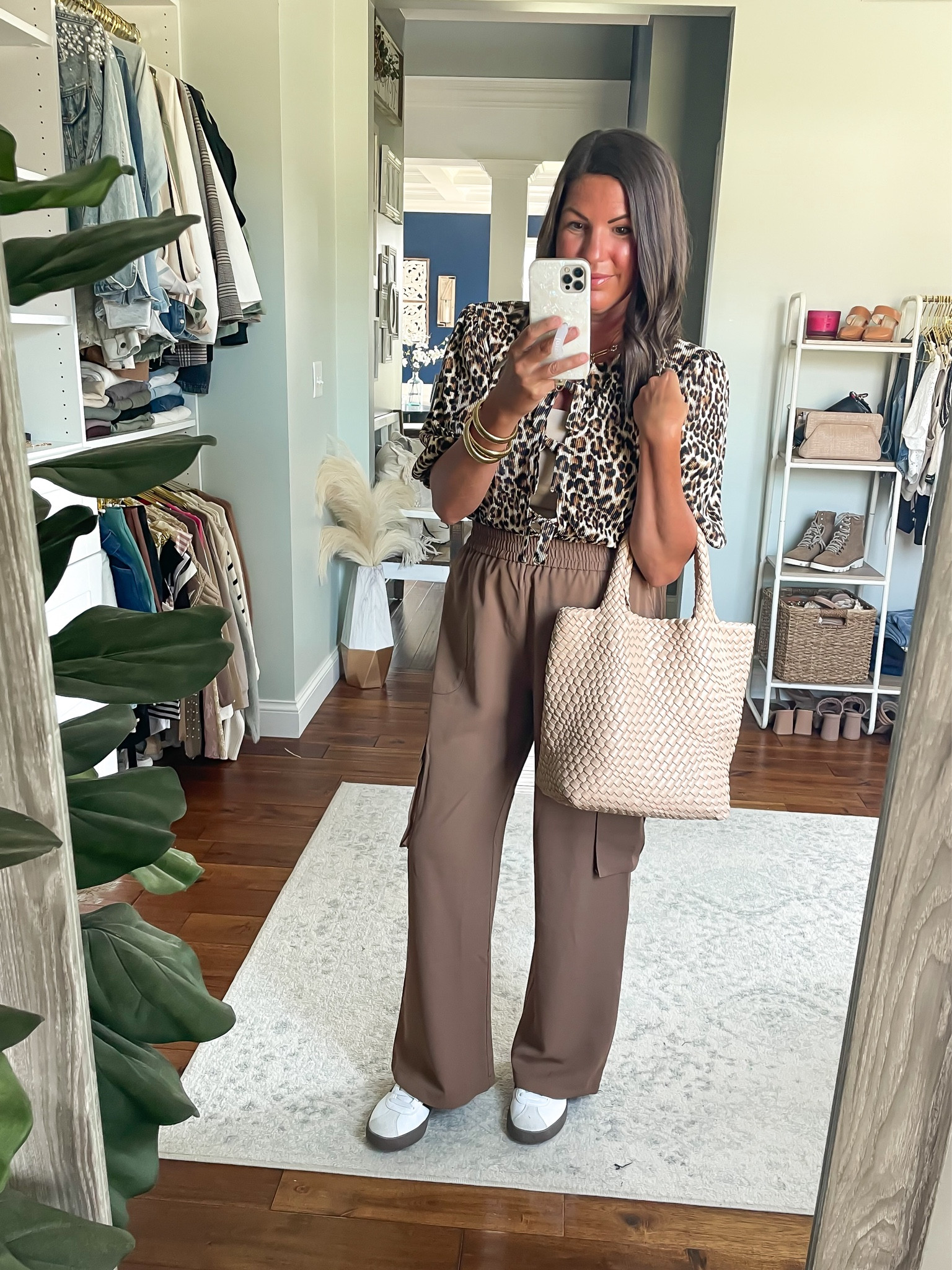 Leopard tie front top with lightweight cargo pants
Sneakers
Leather tote 

#LTKSeasonal #LTKStyleTip #LTKFindsUnder50