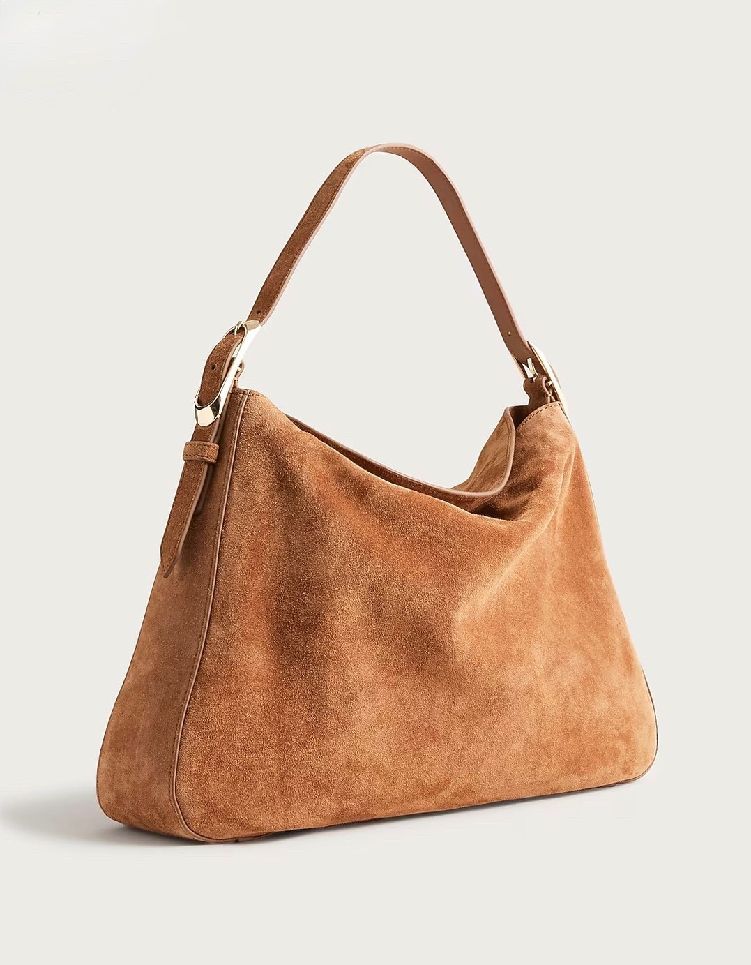 Berkeley shoulder bag in suede

It's finished with a refreshed, streamlined design, an adjustable shoulder strap, an interior card pocket and a magnetic closure—so it's as practical as it is polished

#LTKTravel #LTKSeasonal #LTKWorkwear