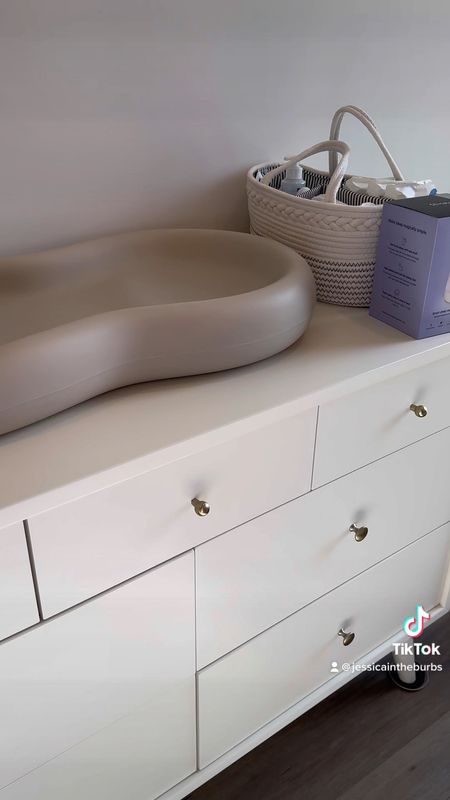 Baby girl’s nursery dresser & changing station. Love the peanut changing pad because it’s so easy to clean! 

#LTKbaby #LTKhome #LTKunder50