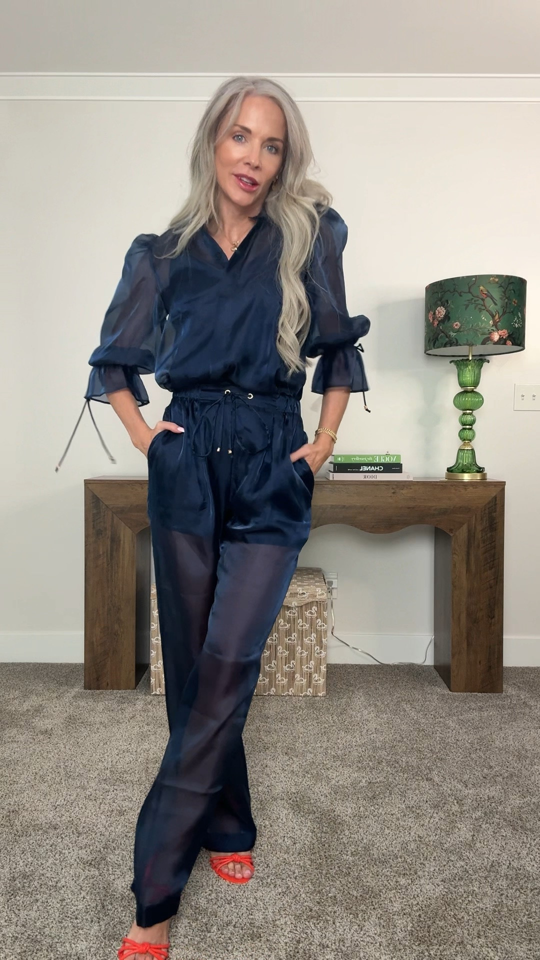 Full transparency — I wasn’t sure about this one at first. But the navy sheer set completely won me over once I styled it with these orange heels. So comfortable, so elevated, and the color is stunning with gray hair. Linked below!