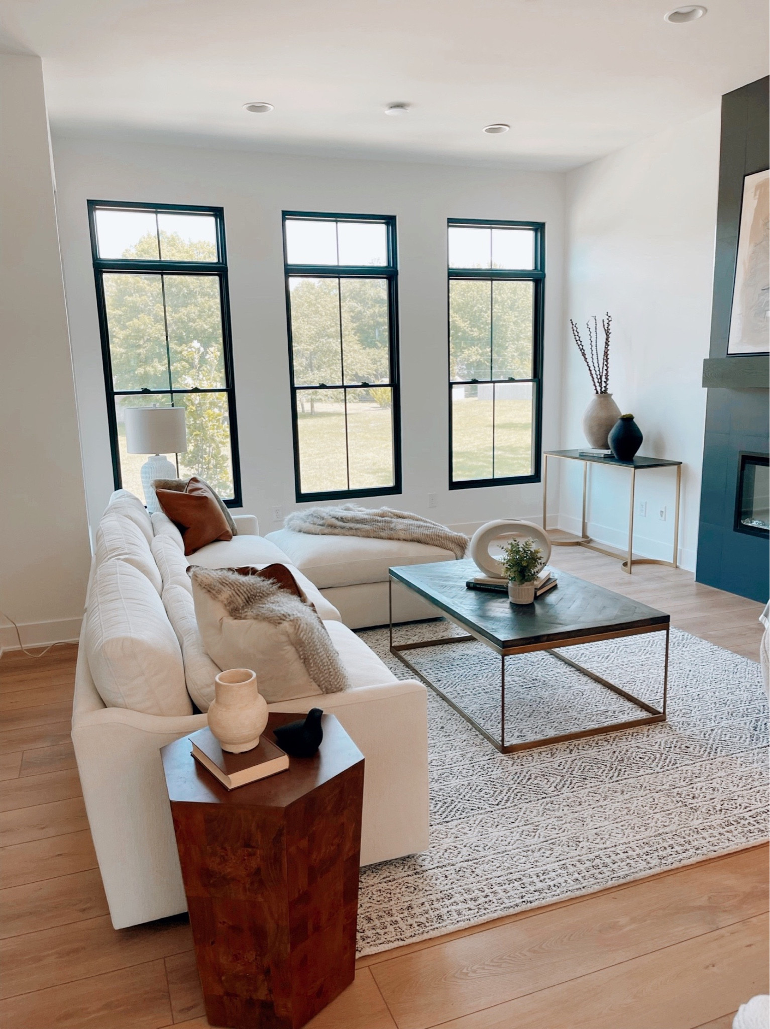 Dream of cozying up by the fire in this  bright and inviting living space 

#LTKfamily #LTKhome