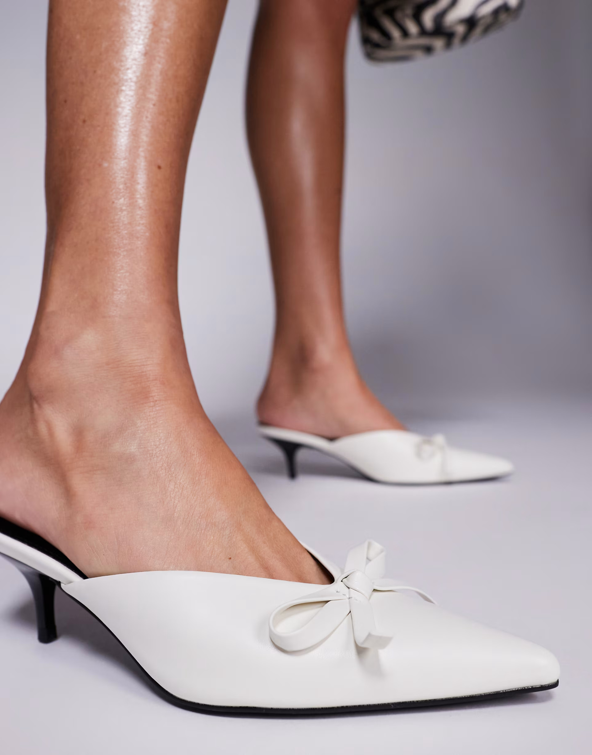 Public Desire Lionheart pointed kitten heel mules with bow in white | ASOS (Global)