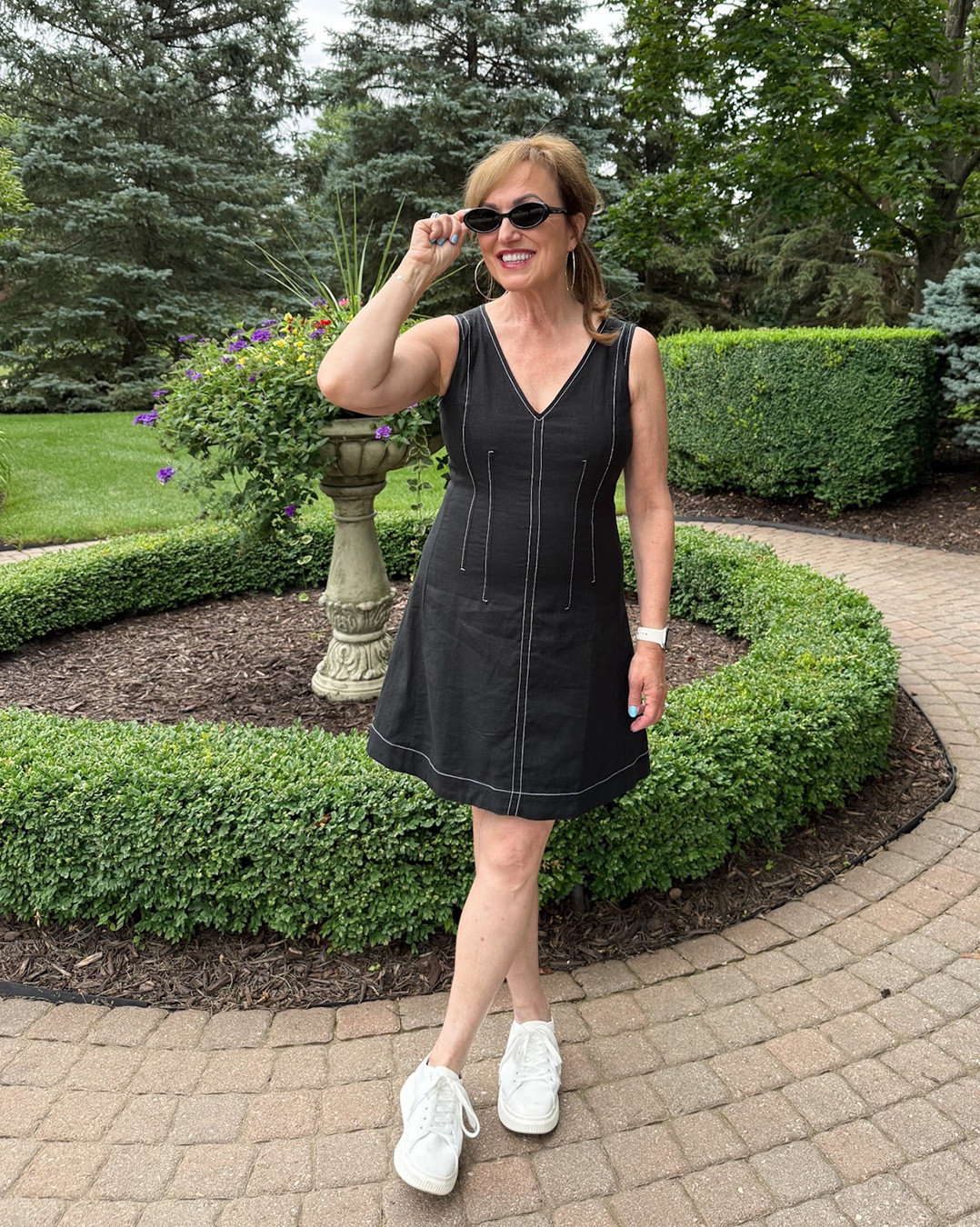 Are you confused by all the trends in sunglasses this summer?  Are they oversized?  Is there a ’90s trend resurgence?  What about the new take on Aviators?

For me, the biggest thing to remember is to pick the pair that best suits your face shape. But you can also work in a trend at the same time. I typically go for oversized or aviators, but I decided to try something different:  the 90s small oval frames.  I was pleasantly surprised at how well they framed my face. They are a keeper!

I recently contributed to an article on Real Simple, “5 Sunglasses Trends Everyone’s Wearing Right Now.”  It will help you discover the trending styles and determine if they are right for you.  You can read it at the “As Seen On” section on my website.

As for my dress, yes, it’s yet another piece from Banana Republic Factory. I don’t wear black too often in the summer since I wear it so much in the winter, but I love the seamed bodice style with the white stitching. I thought it was unique and fun.


#LTKSeasonal #LTKOver40 #LTKStyleTip