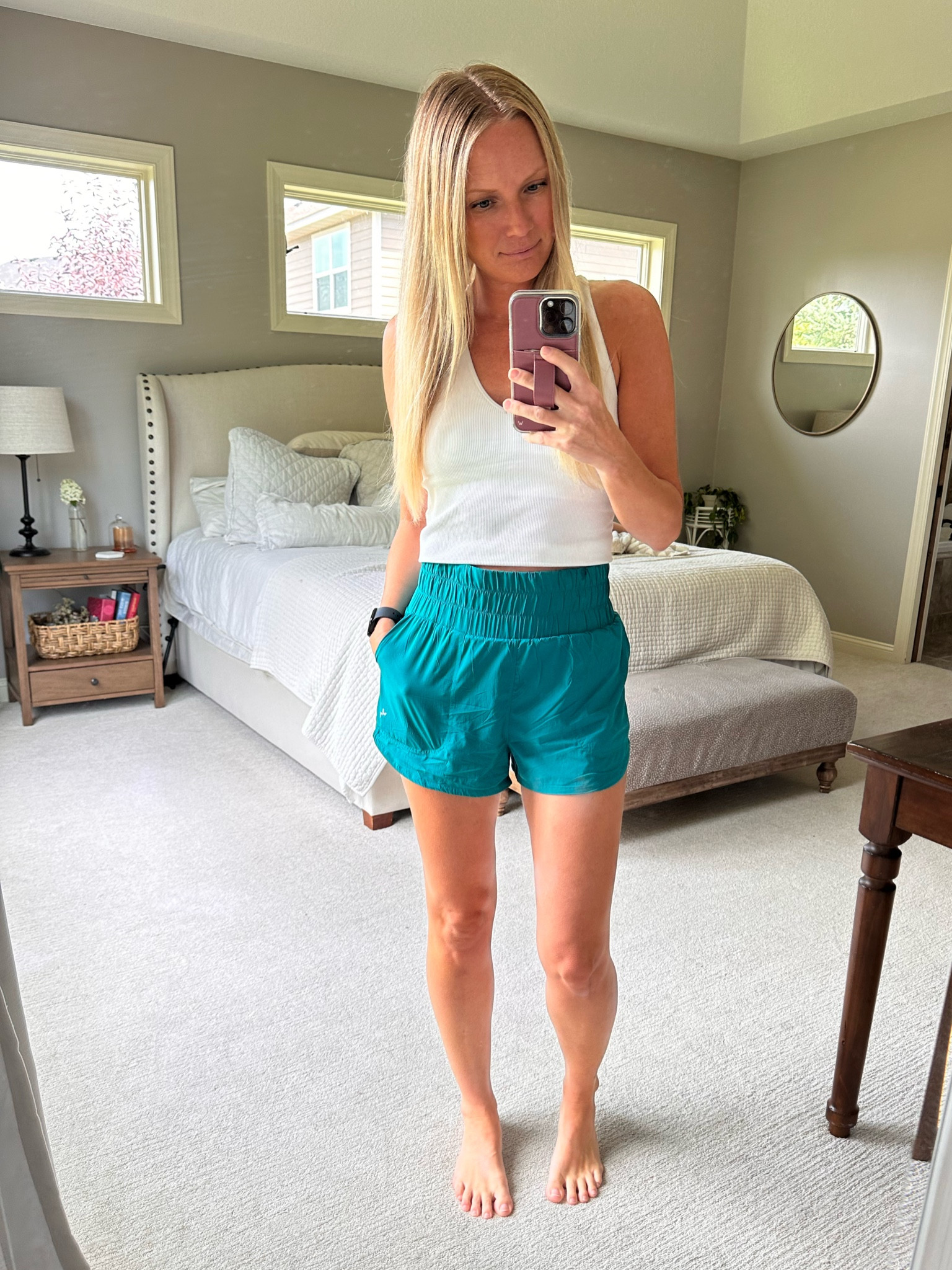 I have this tank and shorts in about 5 colors each! They have been a daily essential for me this summer! 

#LTKFitness