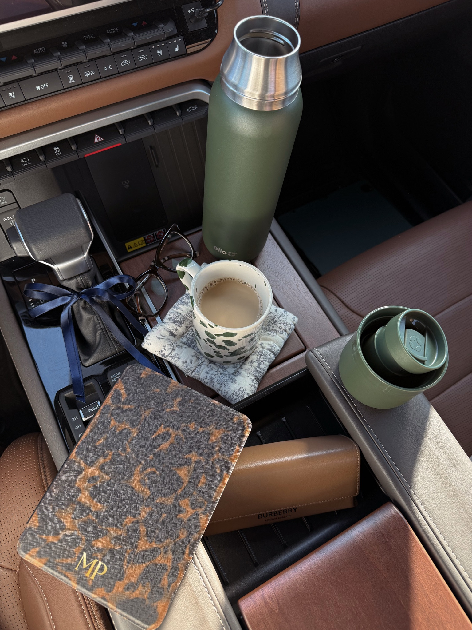 reading and drinking coffee in my car while i wait to pick up my daughter from school.  

 #LTKdayinmylife #LTKmomlife #LTKTravel