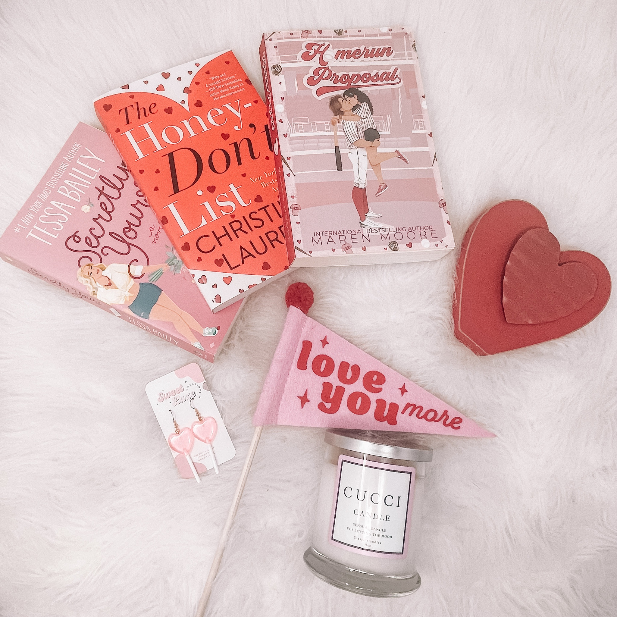 ♥️HAPPY VALENTINES DAY!♥️
I hope everyone gets lots of books because who needs flowers or chocolate when you can have books?😆

Books featured here are:
♥️ Secretly Yours by @tessabaileyisanauthor 
♥️ The Honey-Don’t List by @christinalauren 
♥️ Homerun Proposal by @authormarenmoore 

The heart earrings were from a PR box from @veronicaedenauthor, and y’all have to check out my CUCCI candle. Yes that’s what it is called. Swipe 👈🏼 to know why! I have this linked in bio/ TINALIKESBOOKS.COM ➡️Shop IG Posts if you want one for yourself. It smells so good as well!! 



#LTKGiftGuide #LTKSeasonal #LTKSpringSale