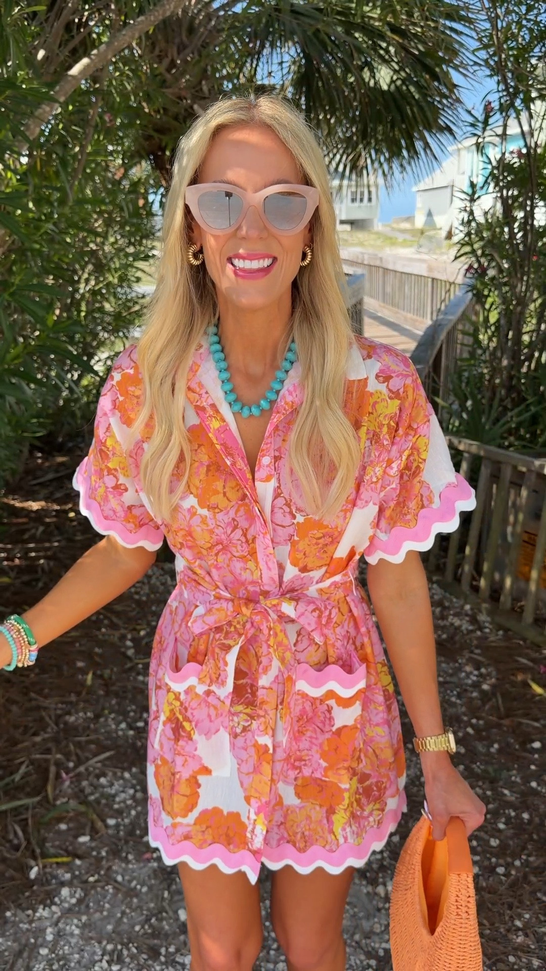 How cute is this floral dress with ric rac detailing?! Love the colors with my orange bag! Part of the new @Avara collection! Use my code AMYANN15 for a discount