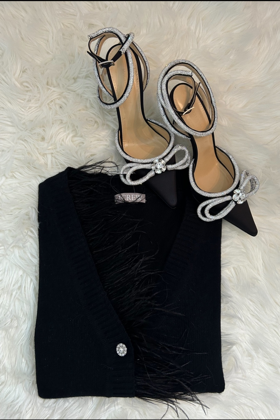 Forever adding feathers to my winter wardrobe 🖤

#LTKworkwear #LTKSeasonal #LTKstyletip