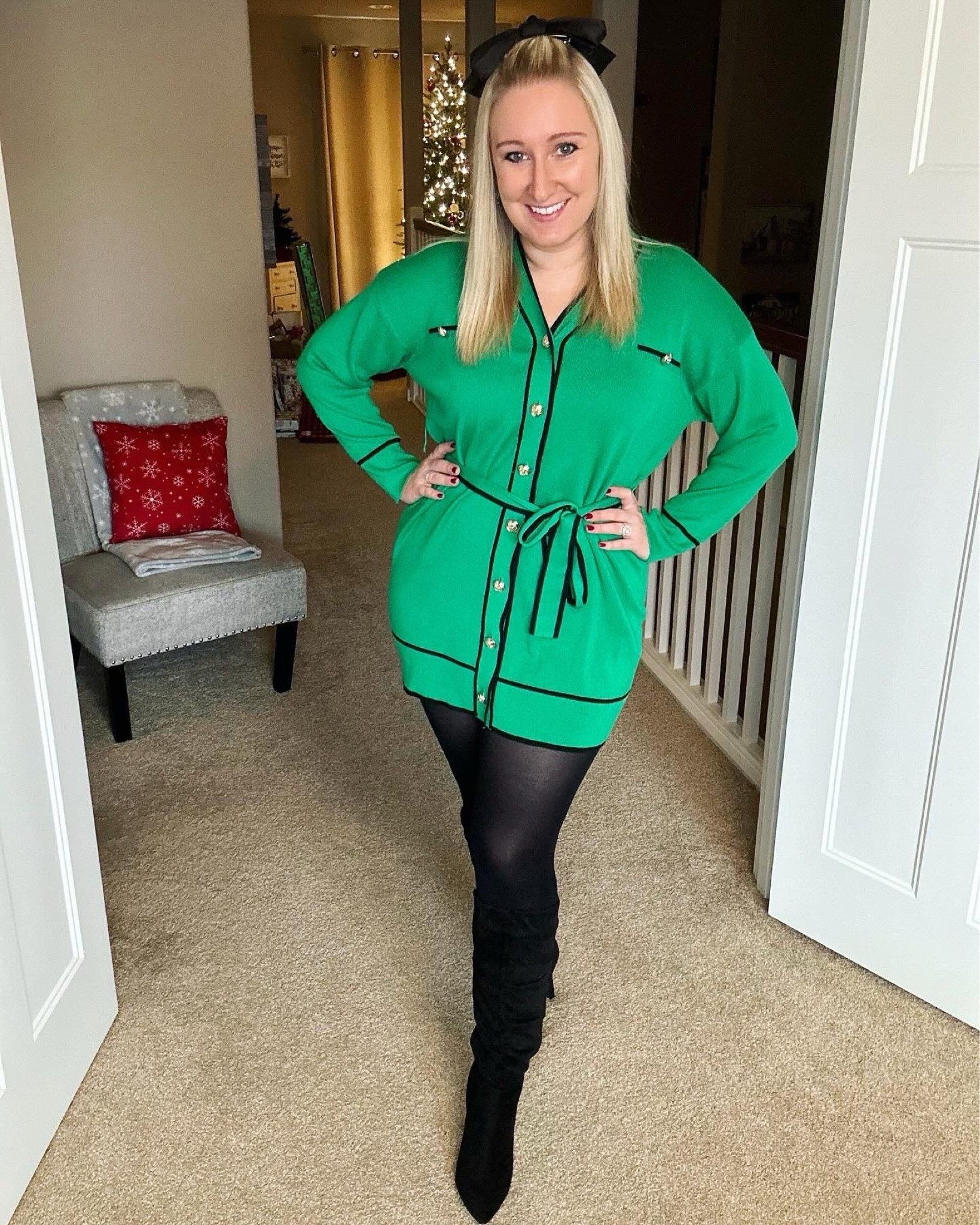 Love this sweater dress and the green color is so fun! It goes perfectly with these tights, boots, and my favorite hair bow! The dress is on sale right now too! 🚨

#LTKsalealert #LTKHoliday #LTKstyletip