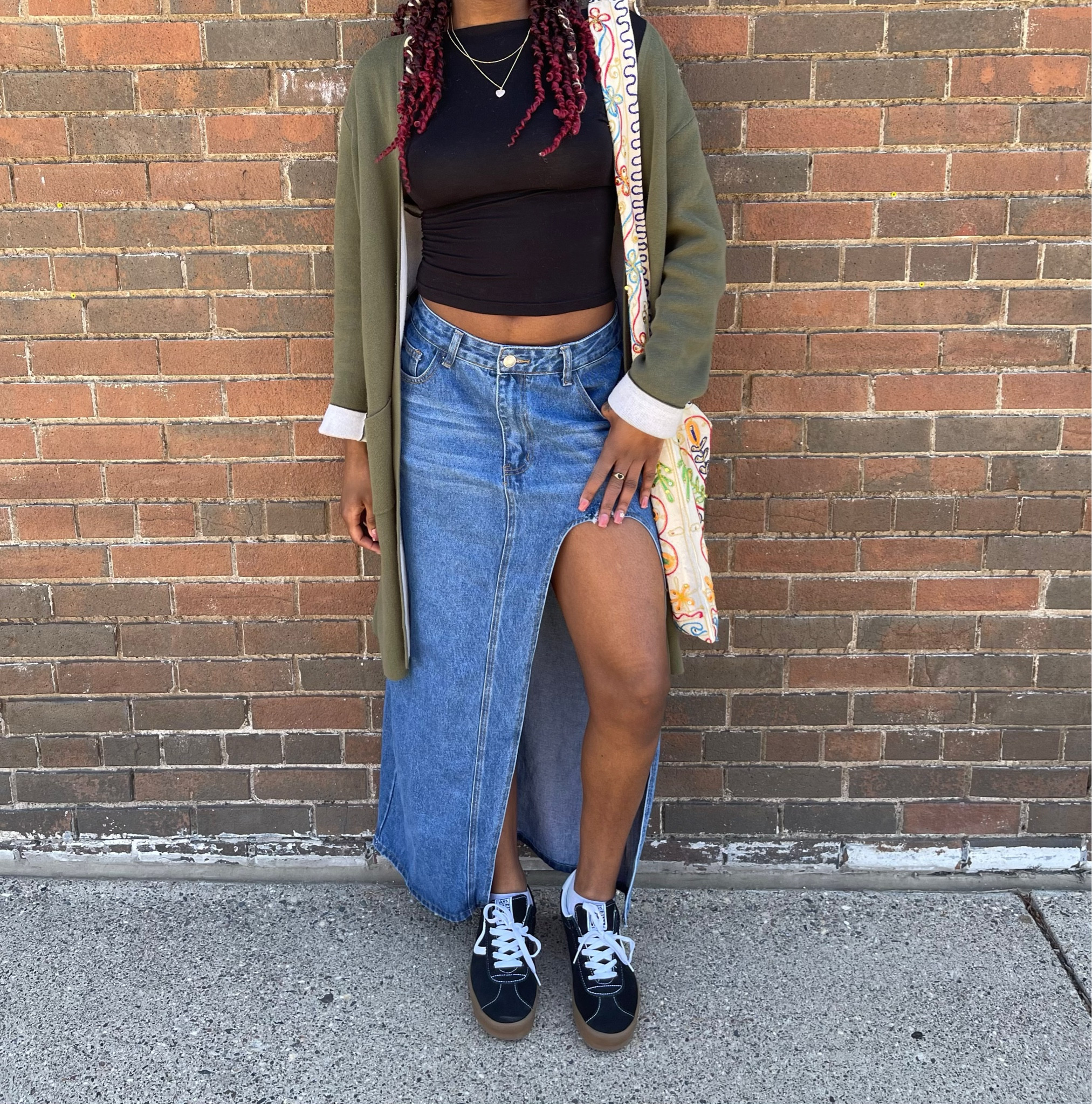 Skirt outfit idea 🖤

Bag: state fair 
Cardigan: thrifted 

#LTKStyleTip #LTKFindsUnder50