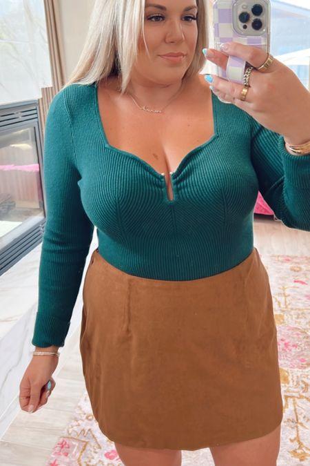 curvy fall outfit! wearing size xl i. ribbed forest green bodysuit {could have taken the large} and size xl in suede skort {could have taken the large}. booties run TTS 

#LTKunder100 #LTKcurves #LTKSeasonal