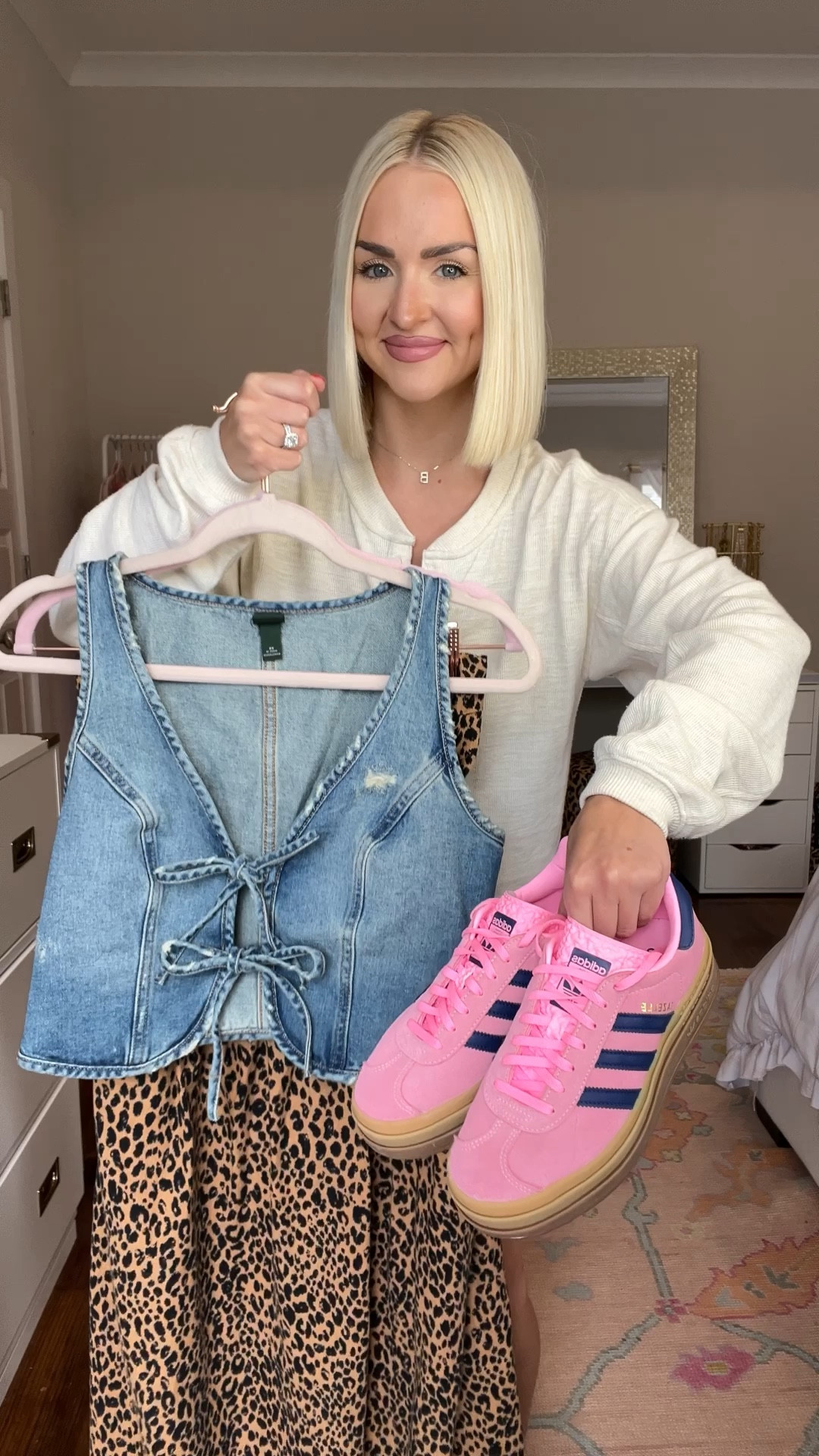 Leopard midi dress with denim front tie vest and pink bubblegum adidas gazelle sneakers 
Sizes: XS in both, 6.5 in sneakers (size down half) 

#LTKStyleTip #LTKVideo #LTKShoeCrush