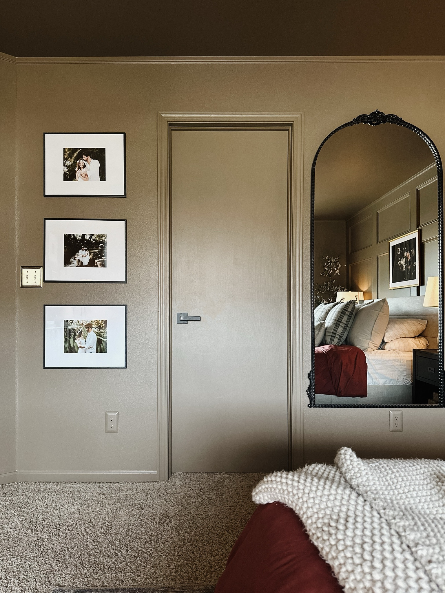 The original mirror I wanted for my bedroom was $900🫠 that wasn’t in the budget so I went on the hunt for a a more affordable look alike and found one that is 1/4th the cost!

Kirkland black mirror, black wall frames, gallery wall, rust duvet, burgundy duvet, brown bedroom, layered bedding, casaluna throw, brass light switch cover, throw pillows, plaid pillows, studio McGee, target home decor, Amazon home decor 

#LTKstyletip #LTKhome