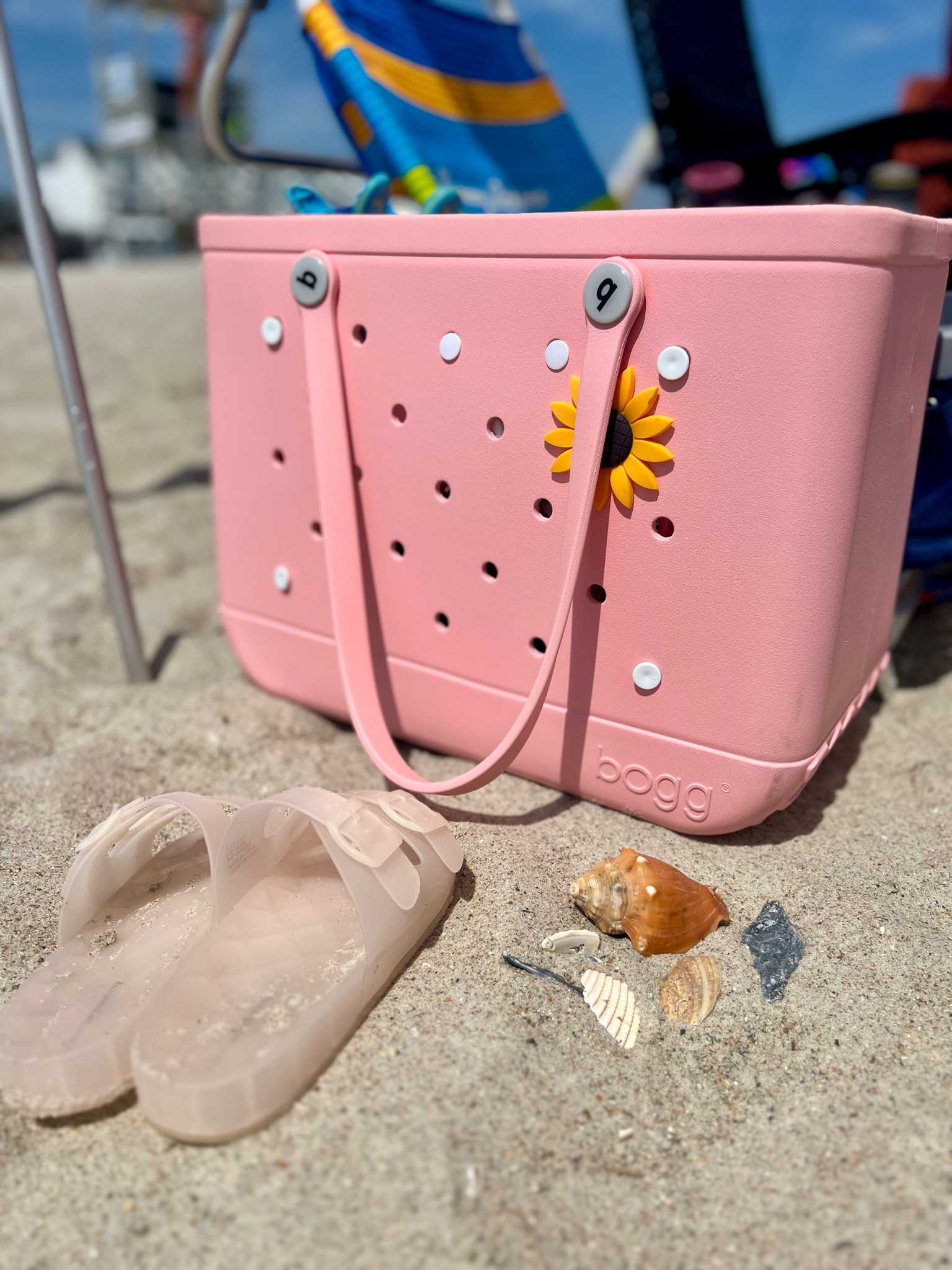 the bogg bag is perfect for the beach! Large & easily cleaned. Plus you can add fun accessories 🌻

#LTKSeasonal