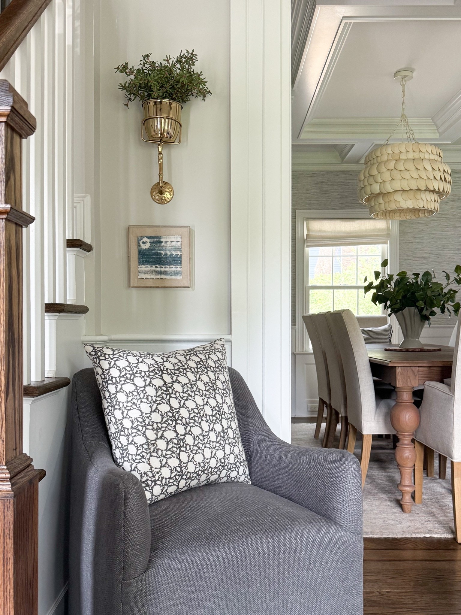 This little corner is proof that every square foot of your home can serve a purpose. Tucked beneath the stairs, a comfortable accent chair, statement sconce, and a single patterned pillow were all it took to create a cozy place to read, enjoy a cup of coffee, or simply slow down for a few minutes. Sometimes the best spaces are the ones you weren’t planning to decorate.

accent chair, cozy reading nook, under stairs ideas, wall sconce, reading corner, home décor inspiration, neutral home, cozy home, interior styling, Girl on the Hudson

#LTKHome #LTKSeasonal #LTKdayinmylife
