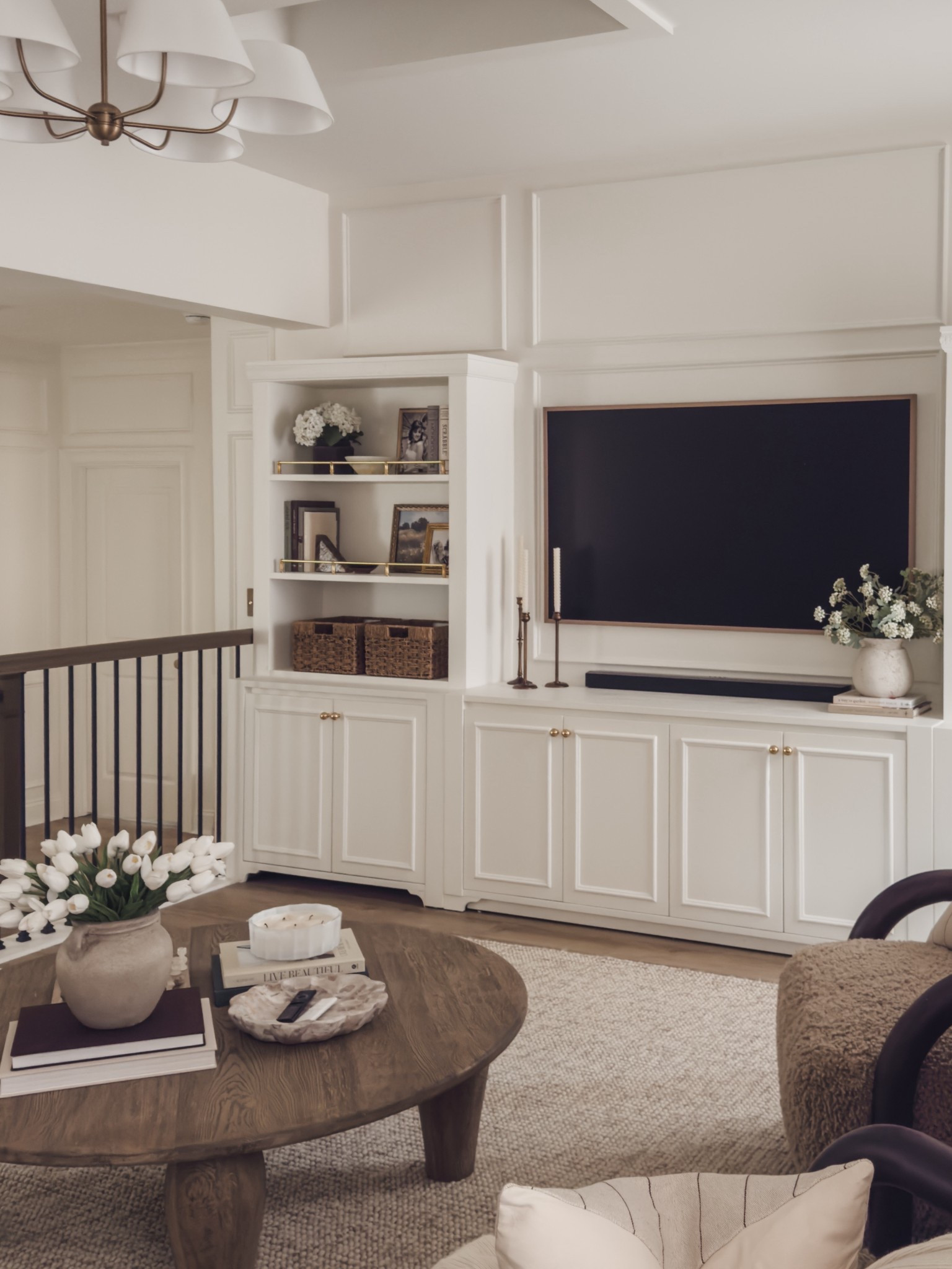 Refreshing my media space for the new year focusing on quality over quantity, plush and durable furniture, and built in style bookshelves for a timeless, collected view!

Home finds, neutral home inspo, spring refresh, neutral wood tones, furniture favorites, neutral area rug, accent chair, round coffee table, media center style, collected style, bookshelf styling, neutral decor book, faux florals, frame tv, creamy whites, wainscoting detail, Joss and Main, Perigold, Wayfair, Four Hands, Castlery, found it on Amazon, Rejuvenation, Pottery Barn style, shop the look!

#LTKSeasonal #LTKHome