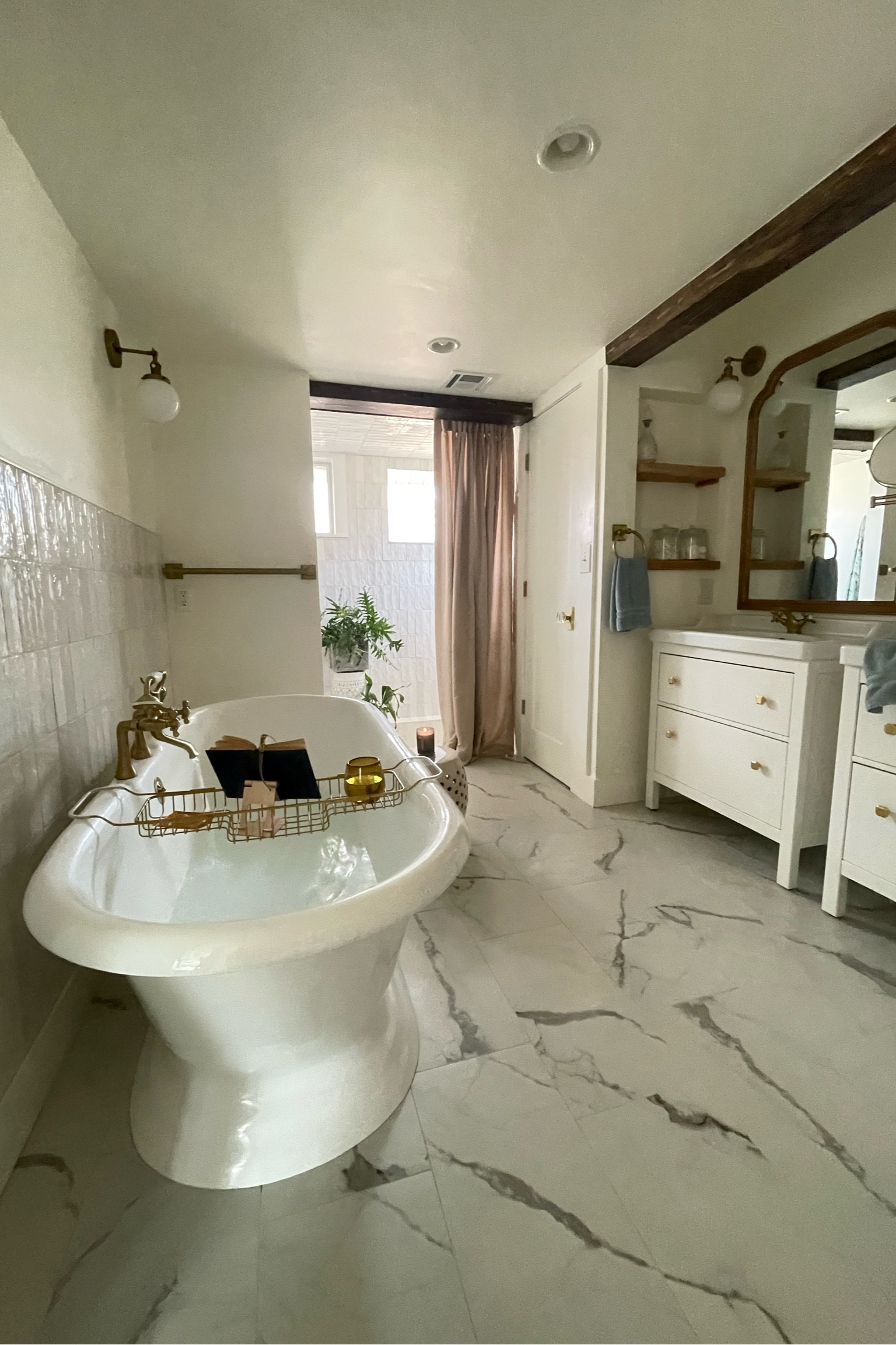 I waited 20 years for this gorgeous bathtub. It was a splurge for us. But very reasonable for a cast iron and porcelain bathtub! 

Feel free to ask us anything about the installation! #masterbathroomremodel #diy

#LTKhome