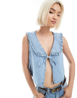 ASOS DESIGN tie front denim waistcoat with frilled collar | ASOS | ASOS (Global)