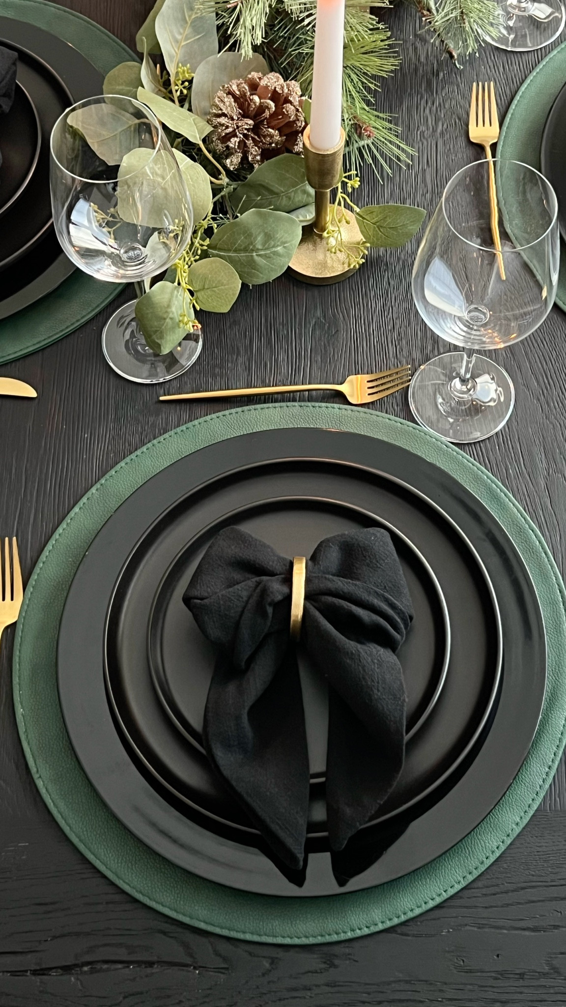 Classic modern tablescape emerald green and black table, black and gold tablescape, matte black dishes, gold, flatware, Christmas tablescape

#LTKSeasonal #LTKHome #LTKHoliday