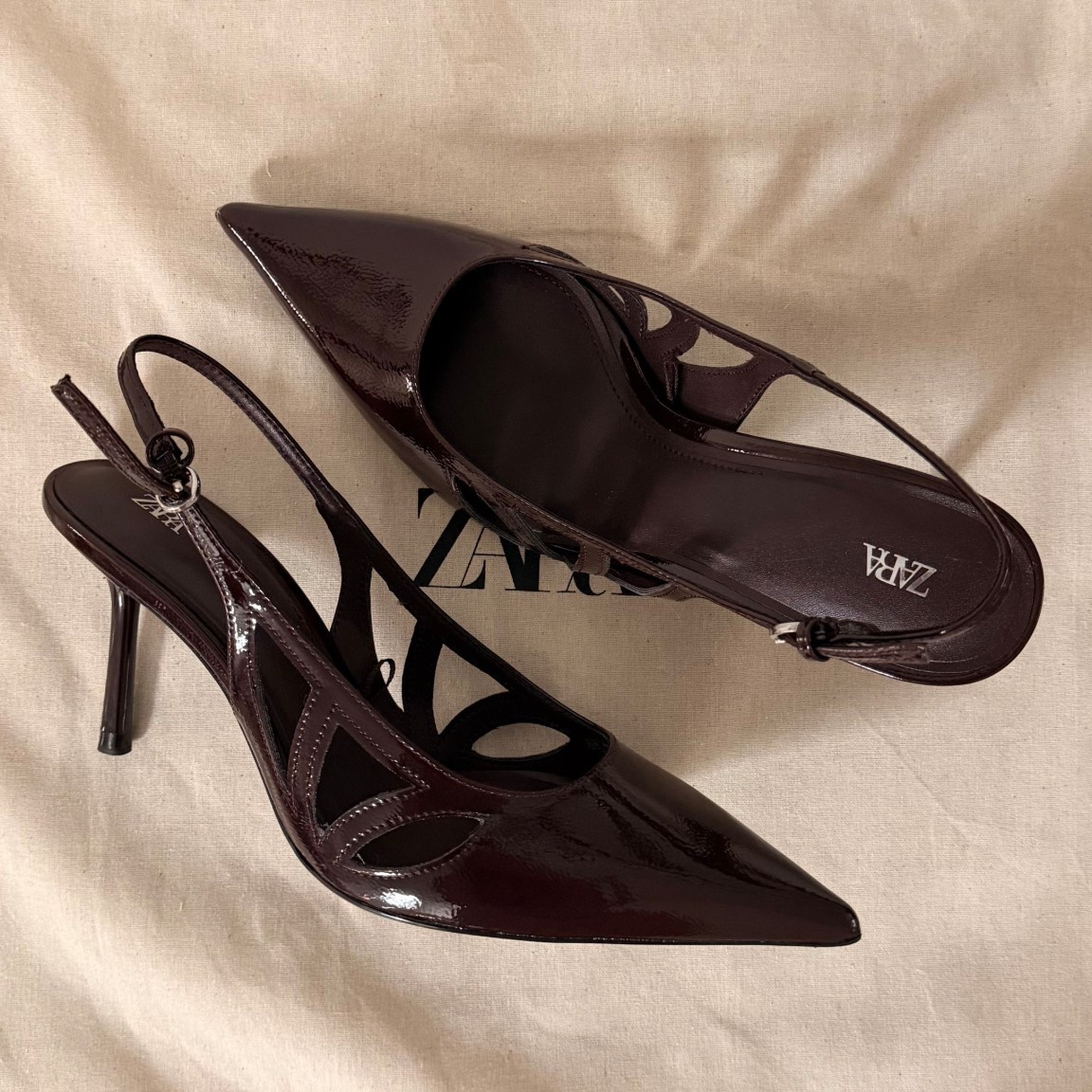 Burgundy is having a moment 🍷
These patent effect heeled shoes from Zara are on sale and instantly make any outfit look elevated. Such a good fall/winter heel 🤍 #LTKSHOES

#LTKWedding #LTKSaleAlert