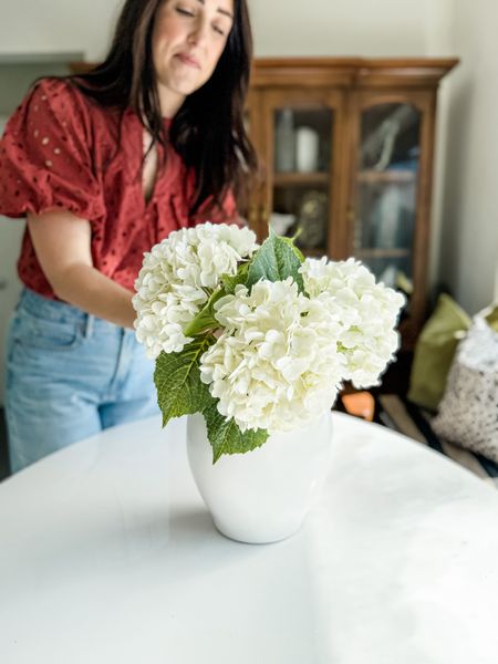 These faux hydrangeas are my favorite to decorate a tabletop! Add to your favorite vase for a seasonal refresh ✨ 

Faux florals, faux stems, seasonal blooms, hydrangeas, tulip dining chair, dining chair, acrylic dining table, dining table, sunroom, breakfast nook, kitchen,dining room, women’s fashion, summer fashion, spring fashion, puff sleeve top

#LTKSeasonal #LTKHome #LTKSaleAlert