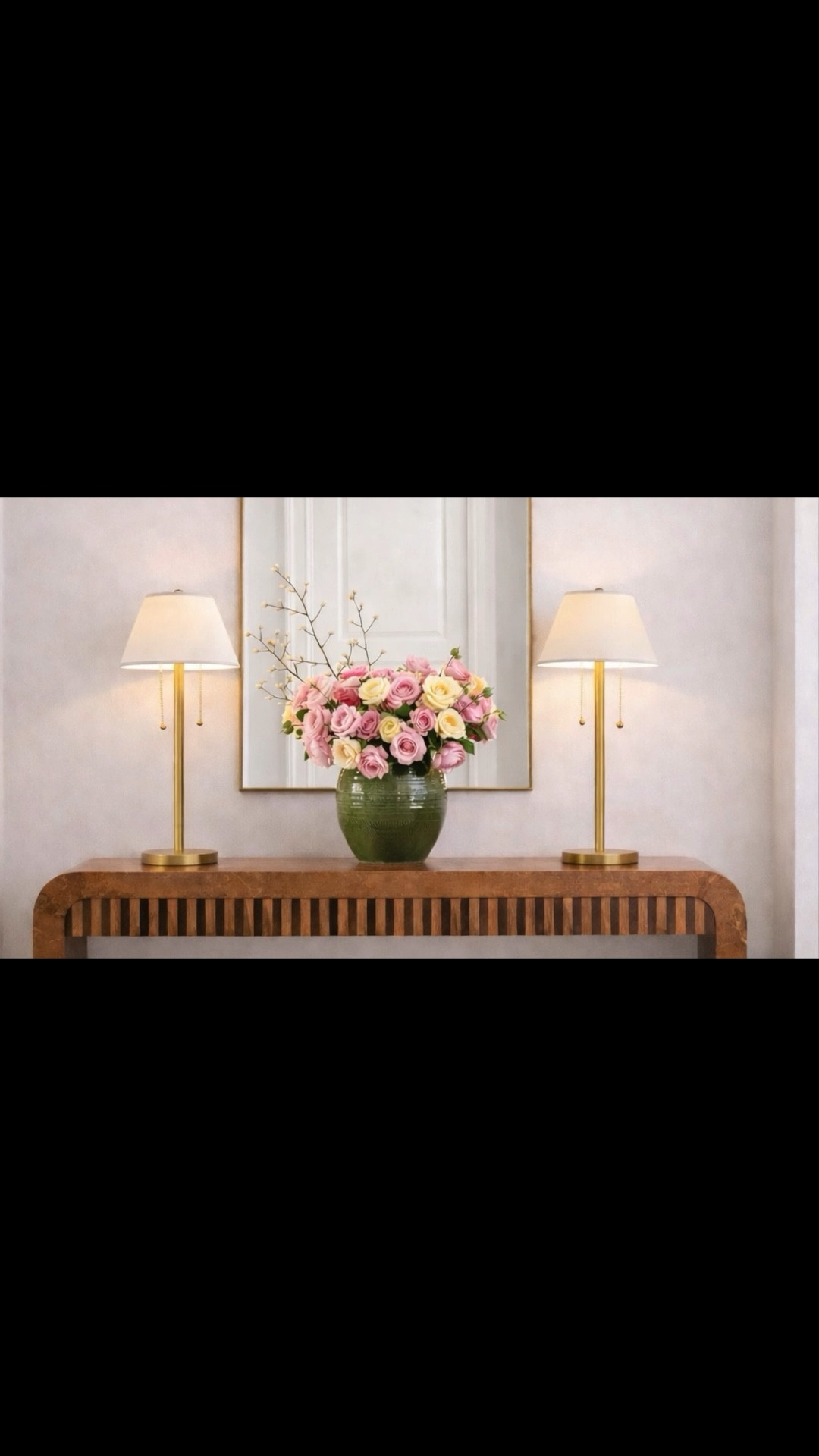 New week, fresh entry ✨

A simple spring refresh that instantly shifts the mood of your home. I anchored this space with a sleek mahogany console — clean lines, but also beautifully functional with built-in drawers for everyday storage.

The arched mirror softens the space, while a mix of pink + butter yellow roses brings in that fresh spring energy. I love how the green ceramic vase grounds the palette, and the subtle checkered rug adds just enough pattern to finish the look without overwhelming it.

And the best part — almost everything in this space is currently on sale ✨
If you’ve been thinking about refreshing your entry, this is the moment to do it.

#entryway #entrywaydecor #springrefresh #springdecor #consoletable #console #mirror #floralarrangement #checkeredrug #rug #homedecor #ltkhome

#LTKFestival #LTKHome #LTKSaleAlert