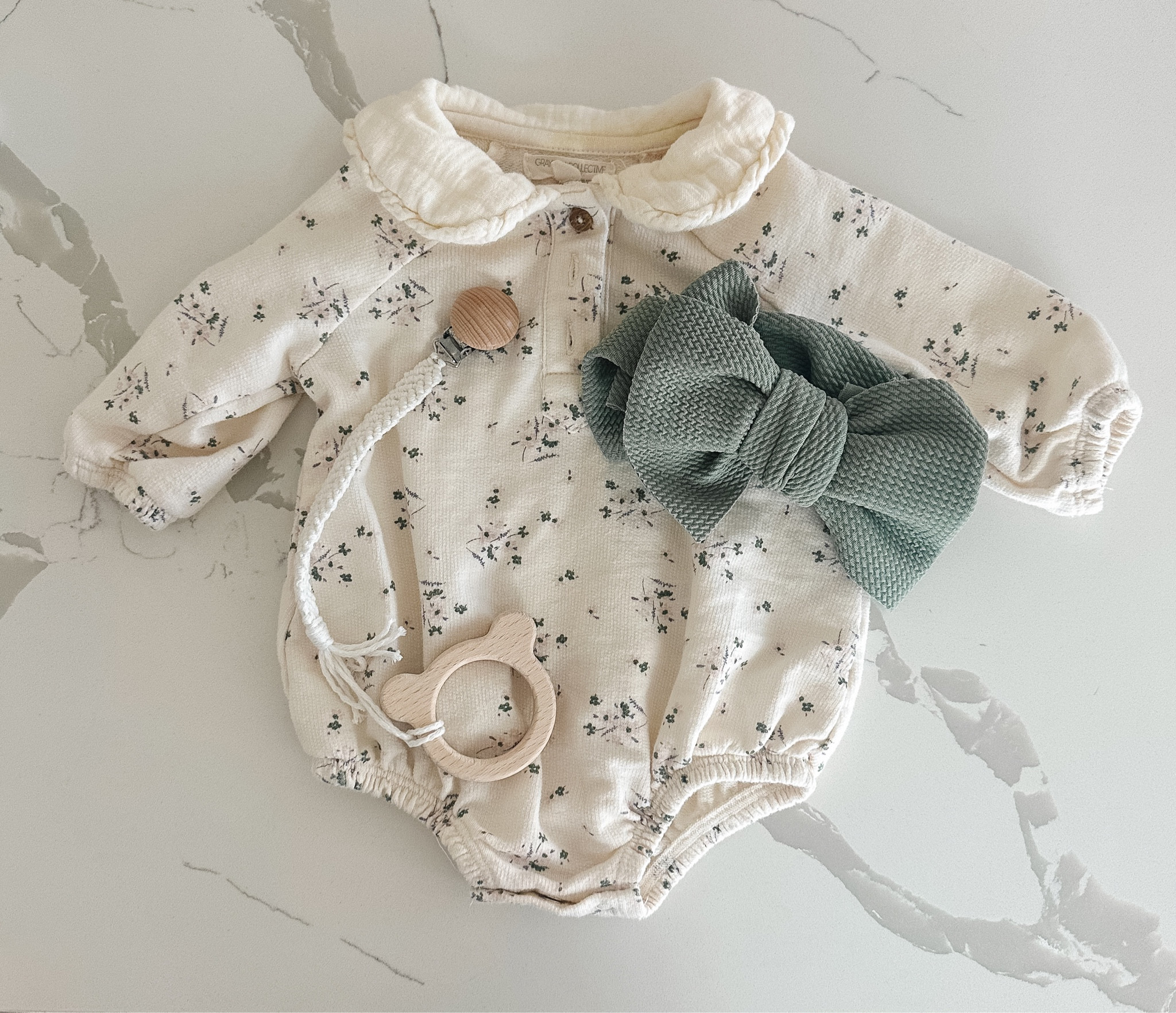 Adorable collared baby outfit with large green bow for fall! Comfy, fits TTS and I love the bubble look 

#LTKstyletip #LTKbaby #LTKSeasonal