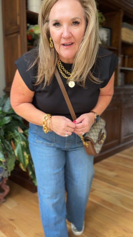 New spanx! This sir essentials tee is luxe! Feels soft and cushiony and buttery. There’s nothing like it. Comes in a stripe, solid black or cream  Wearing an XL

Jeans size XL reg. They’re supposed to be cropped
10% off code NANETTEXSPANX and free shipping easy returns 

Jeans wide leg spring outfit summer tees 

#LTKover40 #LTKSeasonal #LTKmidsize
