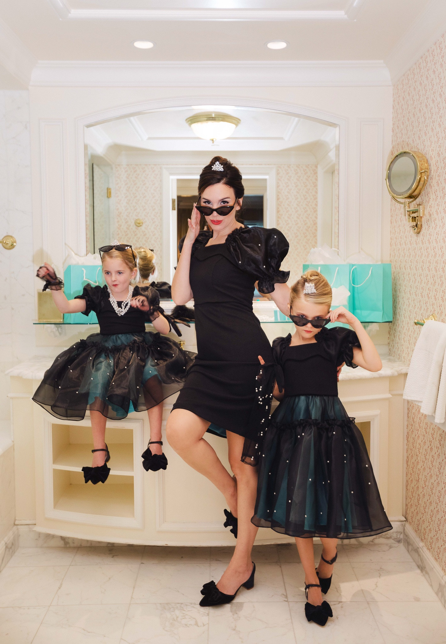 Can I get a little (or even a lot of) commotion for the dresses? I designed this Ivy City which was inspired by the iconic little black dress from Breakfast at Tiffany’s! Can’t get over how sassy my girls were in this shoot. They’re also loving their dress which features the famous Tiffany blue color. Use my code CHRISTY15 for 15% off and channel your inner Audrey Hepburn! 
#celebritystyle #formalwear #dressystyle #kidsclothes #lbd

#LTKStyleTip #LTKSeasonal #LTKKids
